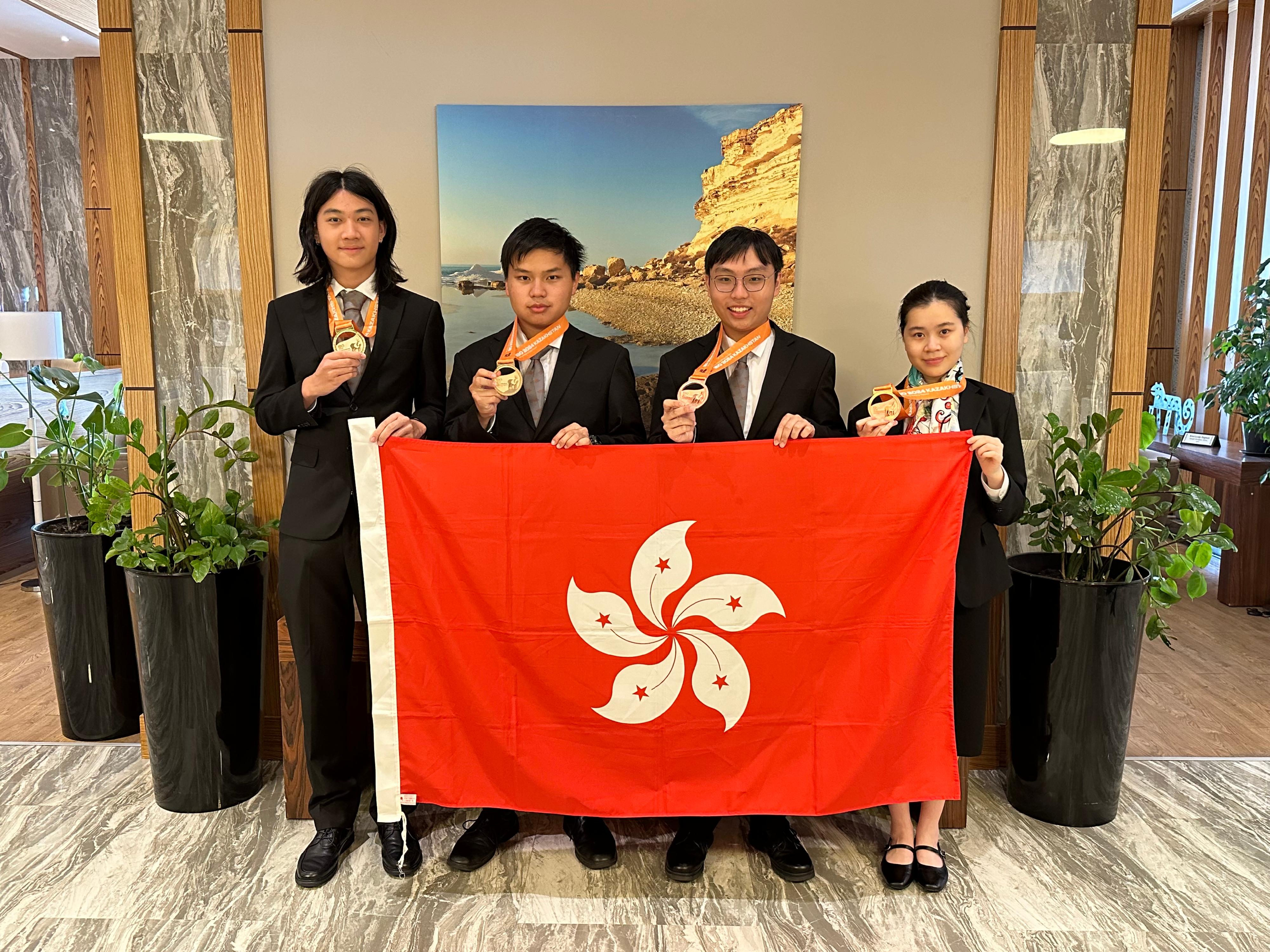 Four students representing Hong Kong achieved excellent results at the 35th International Biology Olympiad held in Astana, Kazakhstan, from July 7 to 14. They are (from left) Zhang Yixuan, Hui Sze-man, Chan Yik-cheung and Sham Pui-yan.