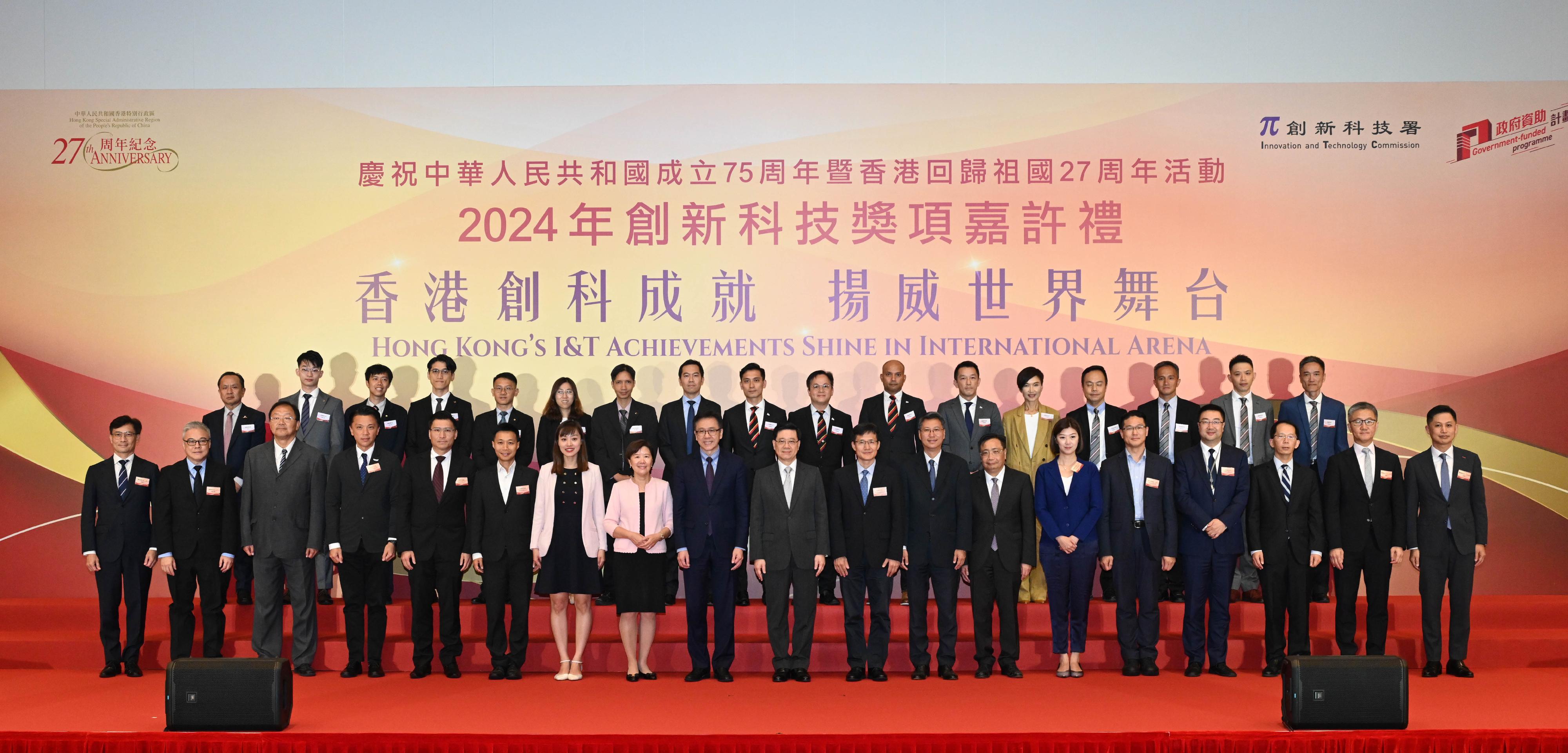 The Chief Executive, Mr John Lee, attended the Reception for I&T Awards 2024 today (July 15). Photo shows (front row, from ninth left) the Secretary for Innovation, Technology and Industry, Professor Sun Dong; Mr Lee; the Director-General of the Department of Educational, Scientific and Technological Affairs of the Liaison Office of the Central People's Government in the Hong Kong Special Administrative Region, Dr Wang Weiming; the Permanent Secretary for Innovation, Technology and Industry, Mr Eddie Mak; and the Commissioner for Innovation and Technology, Mr Ivan Lee; with guests, representatives of award-winning projects of government departments and representatives of the Government at the reception.