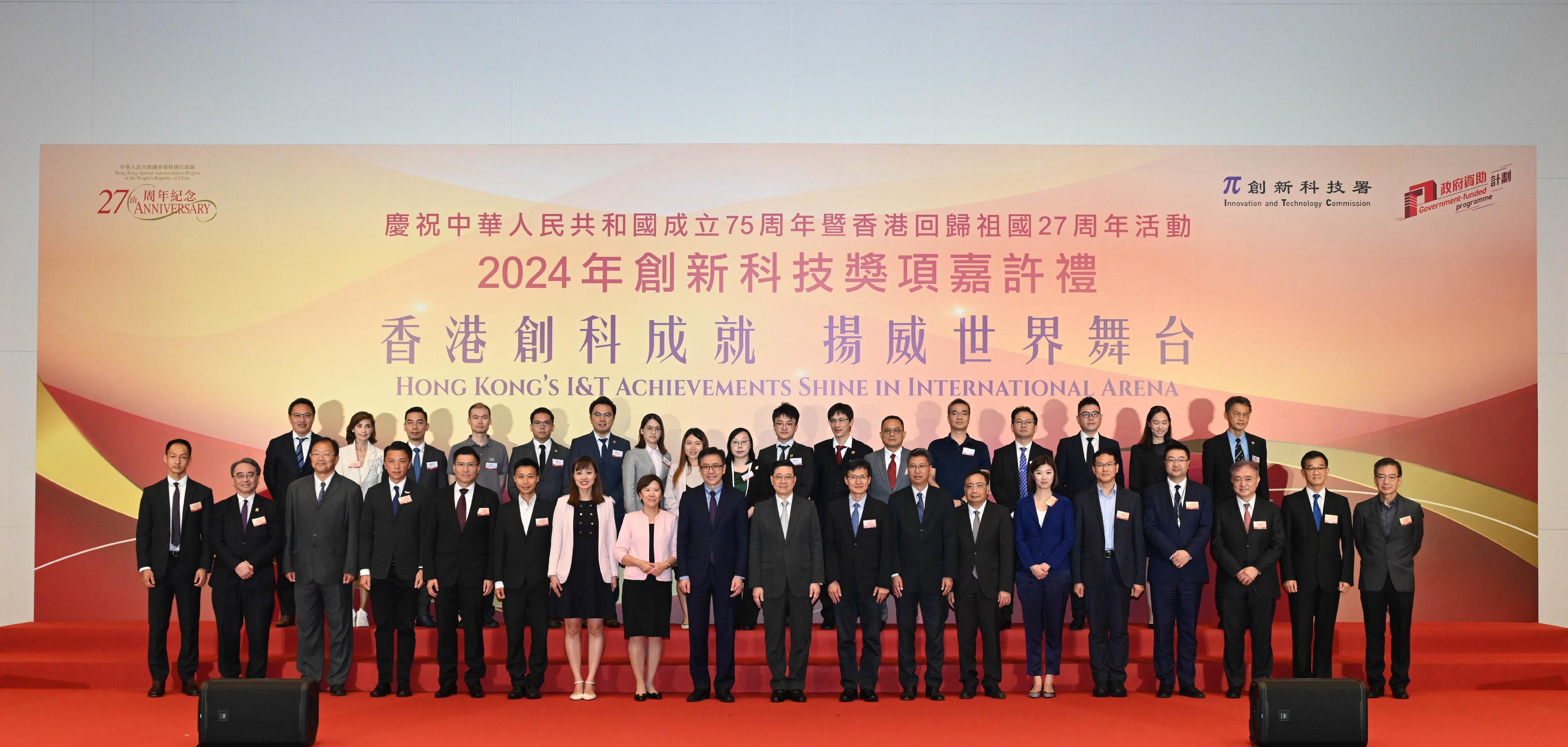 The Chief Executive, Mr John Lee, attended the Reception for I&T Awards 2024 today (July 15). Photo shows (front row, from ninth left) the Secretary for Innovation, Technology and Industry, Professor Sun Dong; Mr Lee; the Director-General of the Department of Educational, Scientific and Technological Affairs of the Liaison Office of the Central People's Government in the Hong Kong Special Administrative Region, Dr Wang Weiming; the Permanent Secretary for Innovation, Technology and Industry, Mr Eddie Mak; and the Commissioner for Innovation and Technology, Mr Ivan Lee; with guests, representatives of other award-winning projects and representatives of other institutions at the reception.
