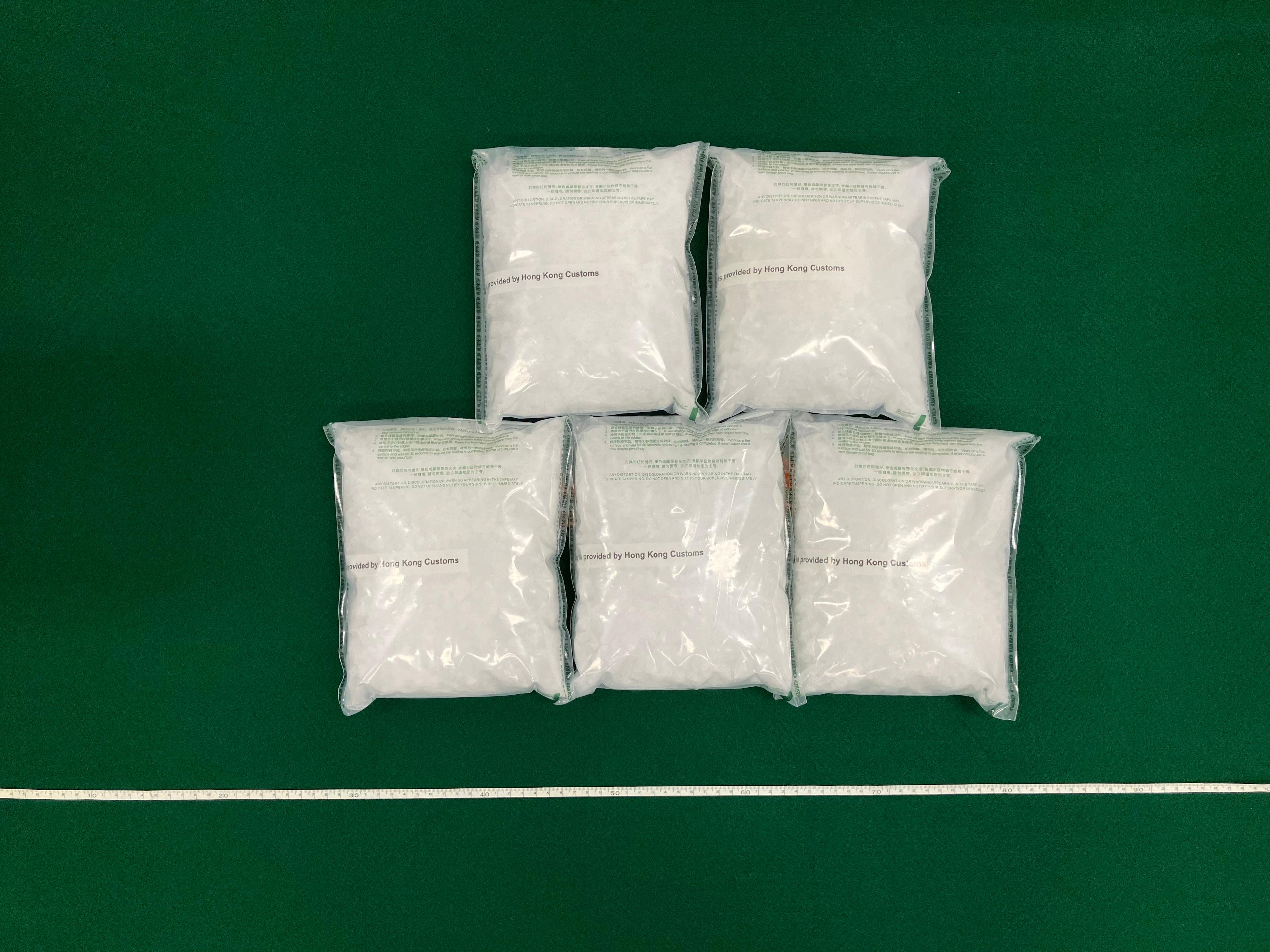 Hong Kong Customs seized about 5.1 kilograms of suspected methamphetamine with an estimated market value of about $2.5 million at the Kwai Chung Customhouse Cargo Examination Compound on June 25. Photo shows the suspected methamphetamine seized.
