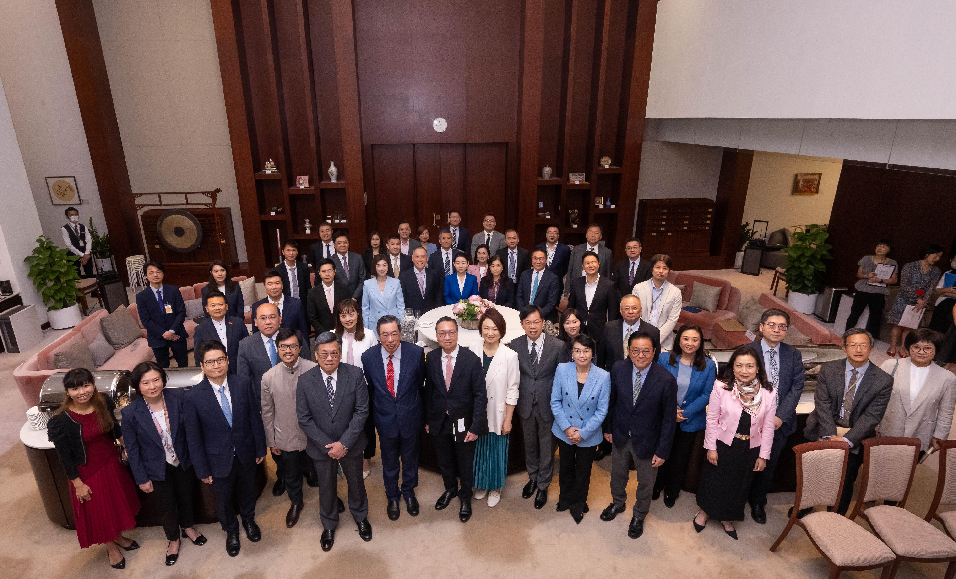 The Secretary for Justice, Mr Paul Lam, SC, attended the Ante Chamber exchange session at the Legislative Council (LegCo) today (July 17). Photo shows Mr Lam (first row, seventh left); the President of the LegCo, Mr Andrew Leung (first row, sixth left); the Secretary for Commerce and Economic Development, Mr Algernon Yau (first row, fifth left); the Under Secretary for Financial Services and the Treasury, Mr Joseph Chan (first row, third left); the Under Secretary for Innovation, Technology and Industry, Ms Lillian Cheong (second row, second left); the Law Officer (International Law) of the Department of Justice, Dr James Ding (first row, third right); the Commissioner for Belt and Road, Mr Nicholas Ho (first row, fourth left); and the Director-General of Investment Promotion, Ms Alpha Lau (first row, second left), with LegCo Members before the meeting.