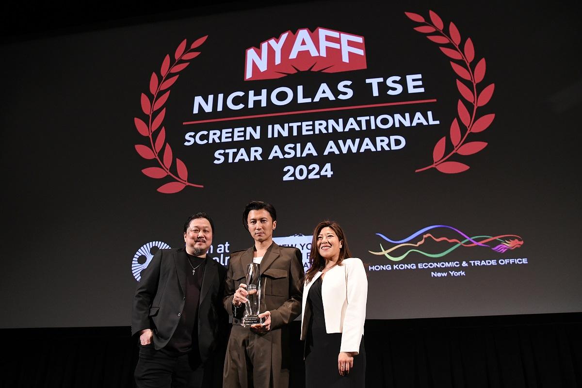 Multitalented Hong Kong actor Nicholas Tse was presented with the Star Asia Award by the New York Asian Film Festival (NYAFF) on July 17 (New York time) in recognition of his dedication and breakthrough performances over the years. Pictured at the award presentation ceremony are the Director of the Hong Kong Economic and Trade Office in New York, Ms Maisie Ho (right); Tse (centre); and the Executive Director of the NYAFF, Mr Samuel Jamier (left). 