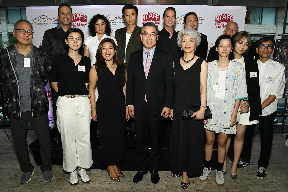 The Hong Kong Economic and Trade Office in New York (HKETONY) hosted a special reception honouring multitalented Hong Kong actor Nicholas Tse, who was presented with the Star Asia Award by the New York Asian Film Festival (NYAFF) on July 17 (New York time). Pictured at the reception are the Director of the HKETONY, Ms Maisie Ho (front row, third left); the Consul General of the People's Republic of China in New York, Mr Huang Ping (front row, fourth left); Josie Ho (back row, second left); Tse (back row, third left); the Executive Director of the NYAFF, Mr Samuel Jamier (back row, second right) and other Hong Kong film-makers in attendance at the NYAFF.