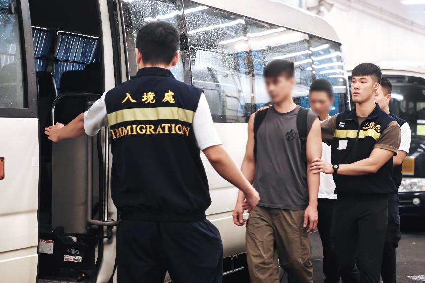 The Immigration Department (ImmD) carried out repatriation operations from July 17 to today (July 19). A total of 61 unsubstantiated non-refoulement claimants were repatriated to their places of origin. Photo shows removees being escorted by ImmD officers to proceed to the airport from the detention place.