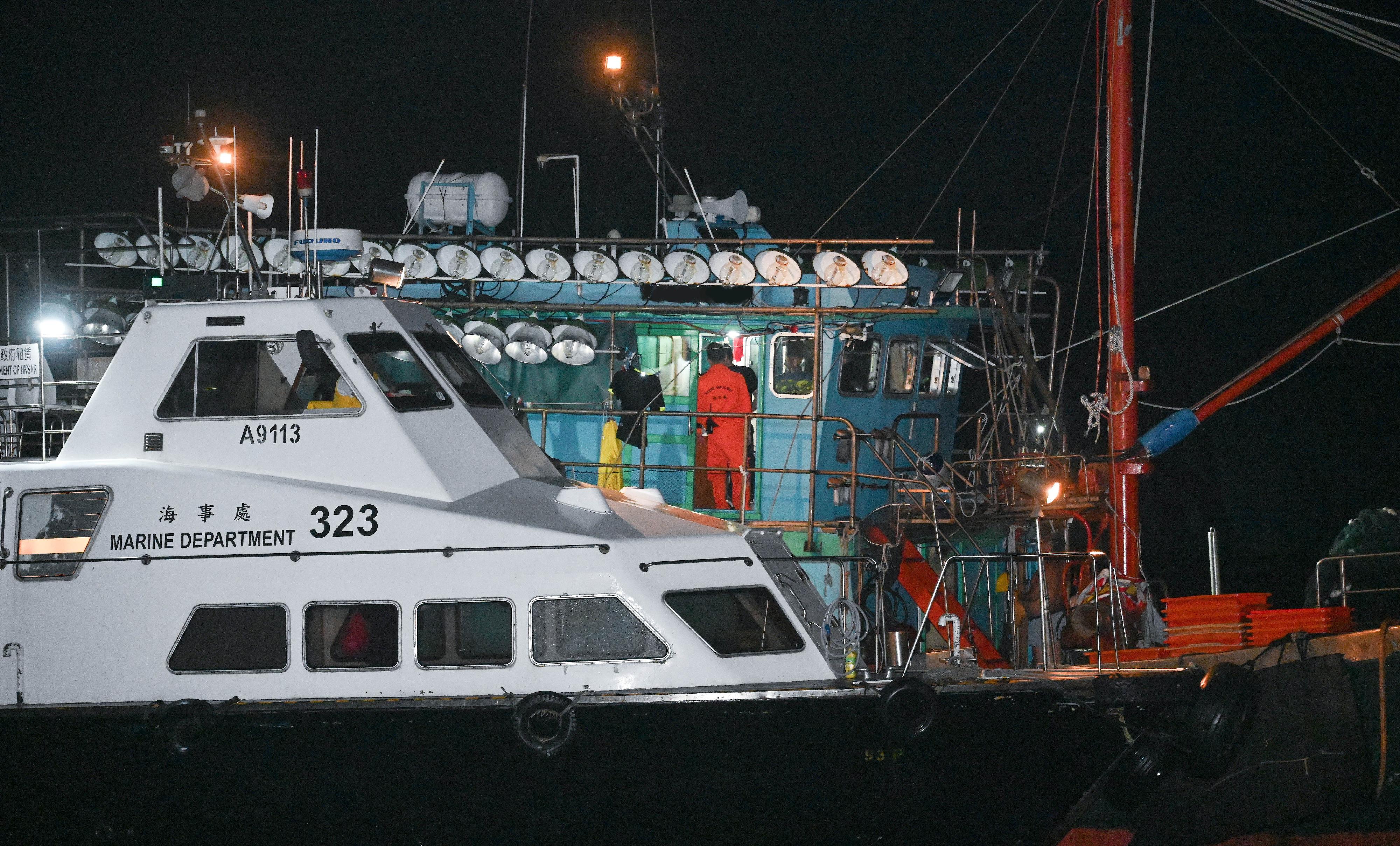 The Marine Department conducted special operations against the improper use of bright light for fishing and illegal fishing activities in the eastern and southern waters of Hong Kong on July 8, 16 and 19. Photo shows MD officers conducting an inspection on board a vessel.