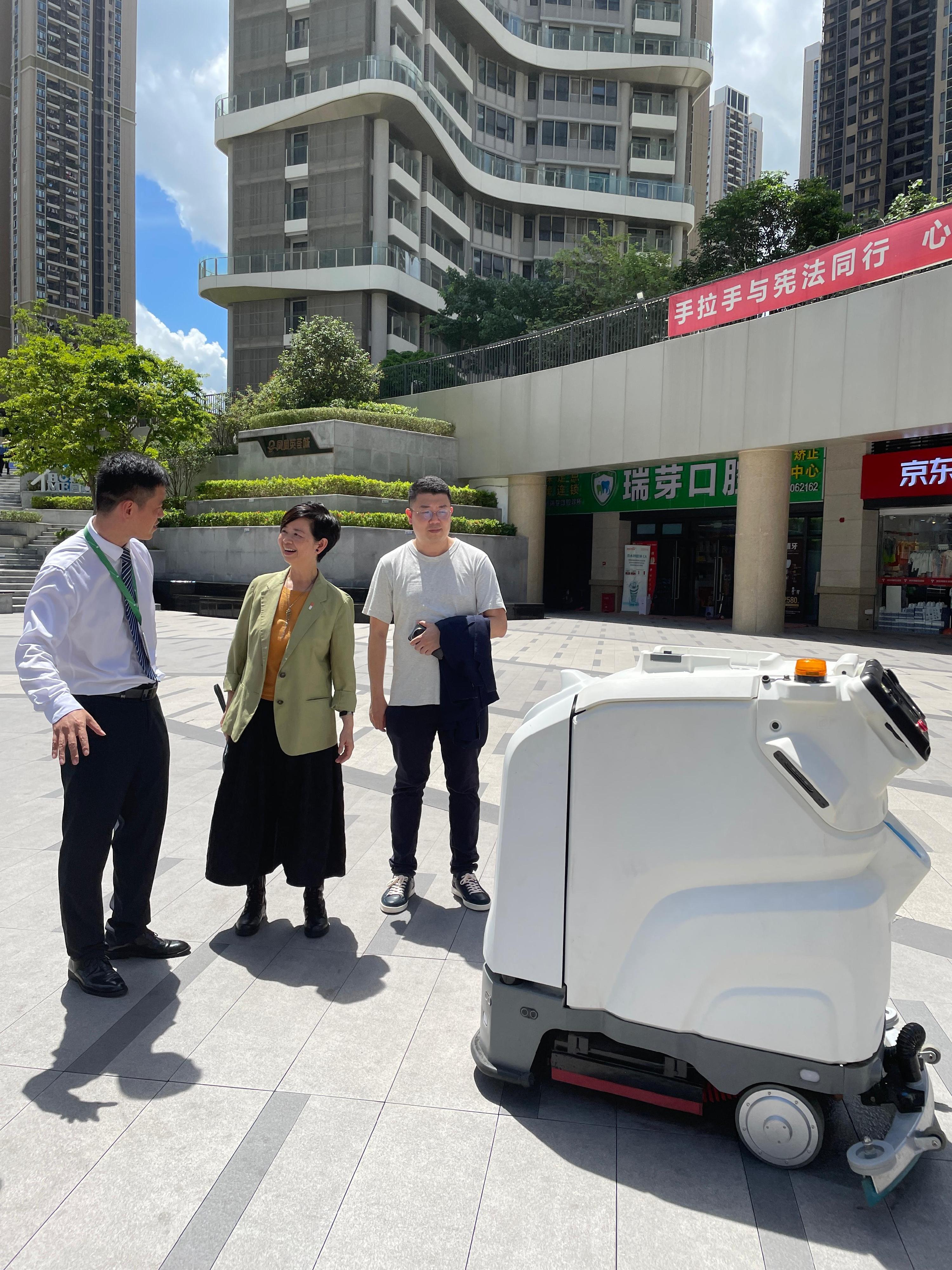 The Secretary for Housing, Ms Winnie Ho, together with a delegation of the Housing Department and the Legislative Council (LegCo) Panel on Housing, continued their visit to Shenzhen today (July 22). Photo shows Ms Ho (centre) touring the public rental housing project Phoenix Yinghui Town.