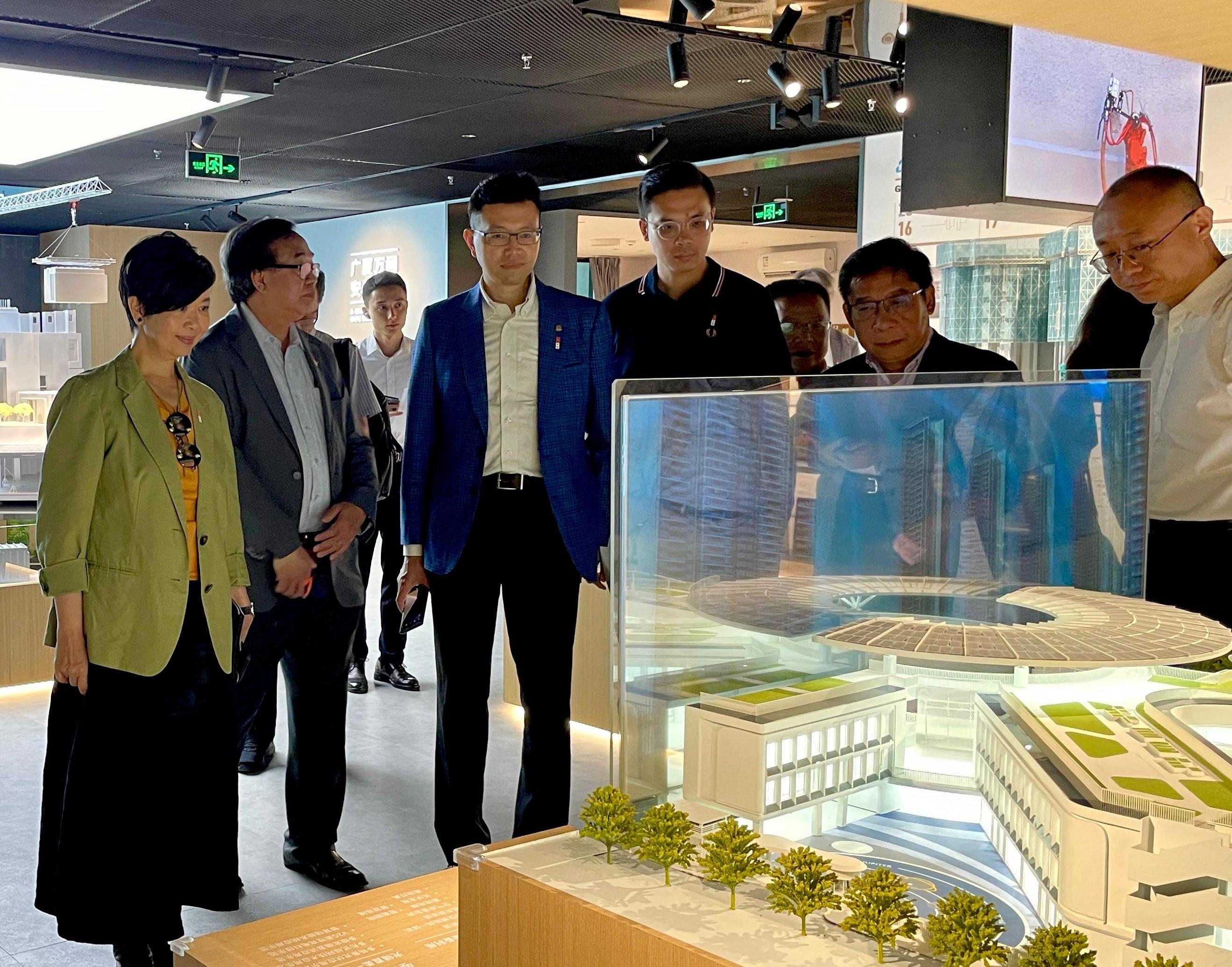 The Secretary for Housing, Ms Winnie Ho, together with a delegation from the Housing Department and the Legislative Council (LegCo) Panel on Housing, continued their visit to Shenzhen today (July 22). Photo shows Ms Ho (first left) and the Chairman of the LegCo Panel on Housing, Mr Stanley Ng (third left), visiting Shenzhen Indemnificatory Housing Exhibition Hall.