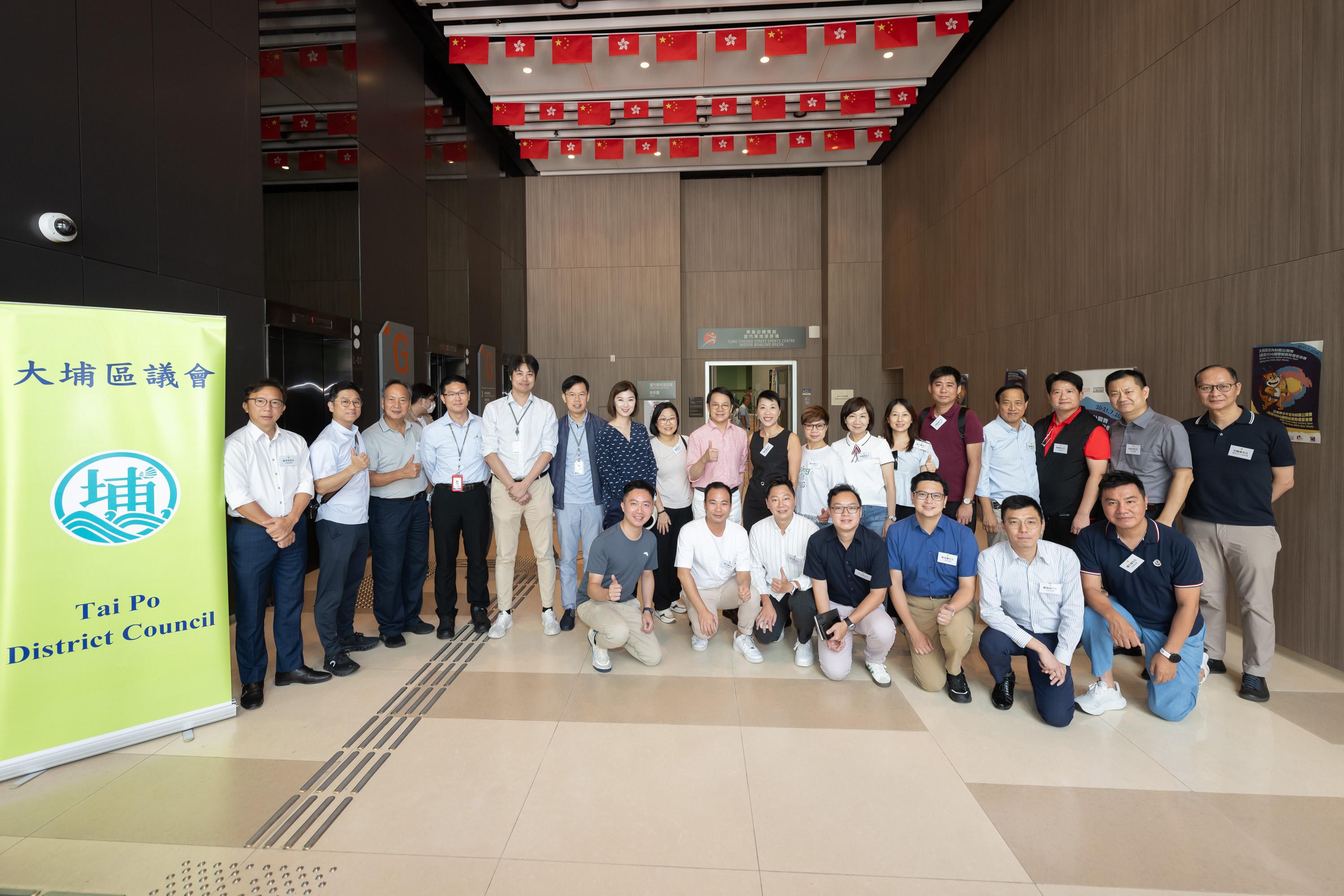 The Legislative Council (LegCo) Members and Tai Po District Council (DC) members visit Lam Tsuen River and Kwong Fuk Bridge in Tai Po today (July 23). Photos shows LegCo Members, Tai Po DC members and representatives of relevant government departments before the visit to Lam Tsuen River and Kwong Fuk Bridge in Tai Po.