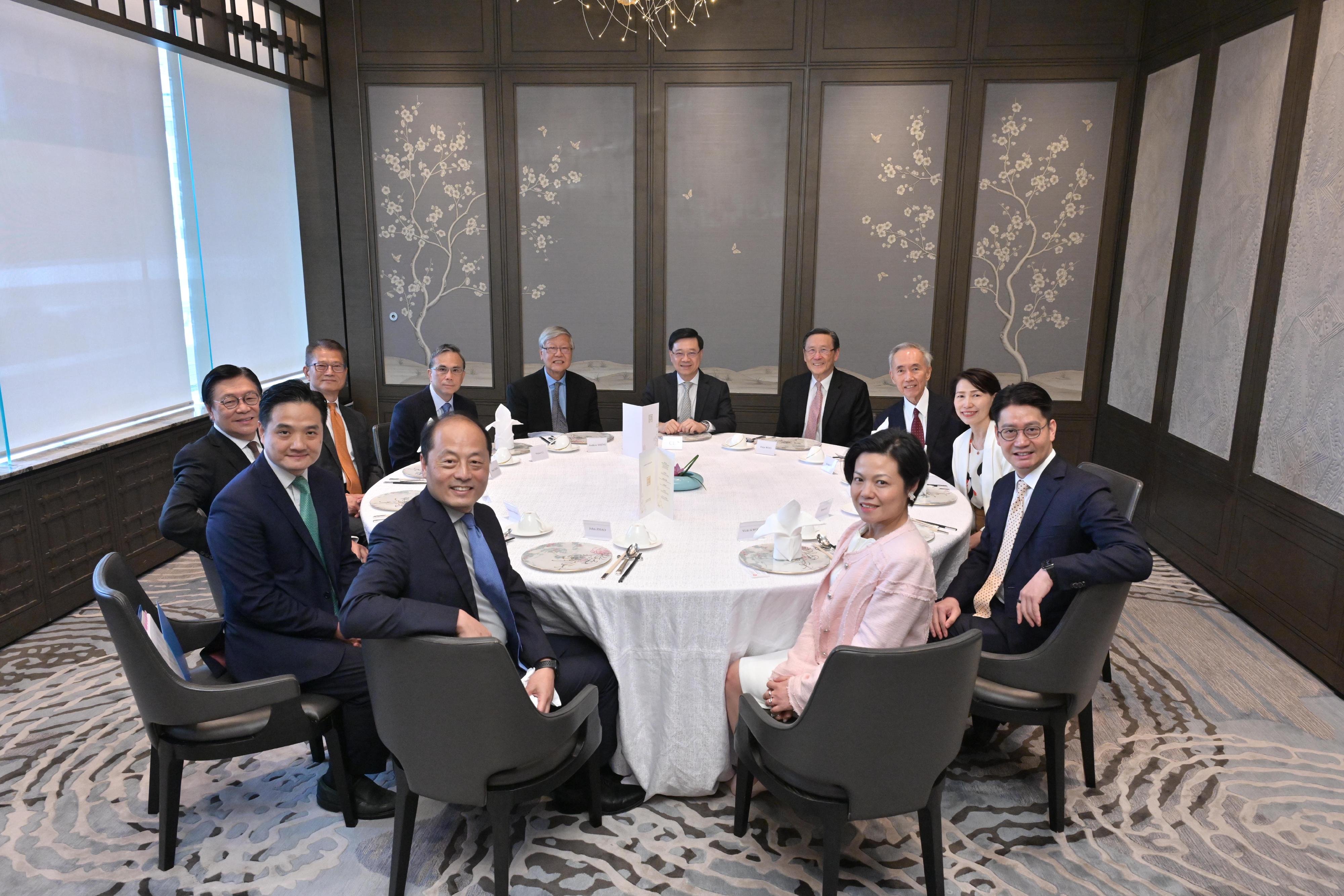 The Chief Executive, Mr John Lee, hosted the luncheon meetings of the Chief Executive's Council of Advisers (CECA) on July 22, July 23 and today (July 25) to listen to the views expressed by CECA members for the forthcoming Policy Address. Photo shows the session of economic advancement and sustainability.
