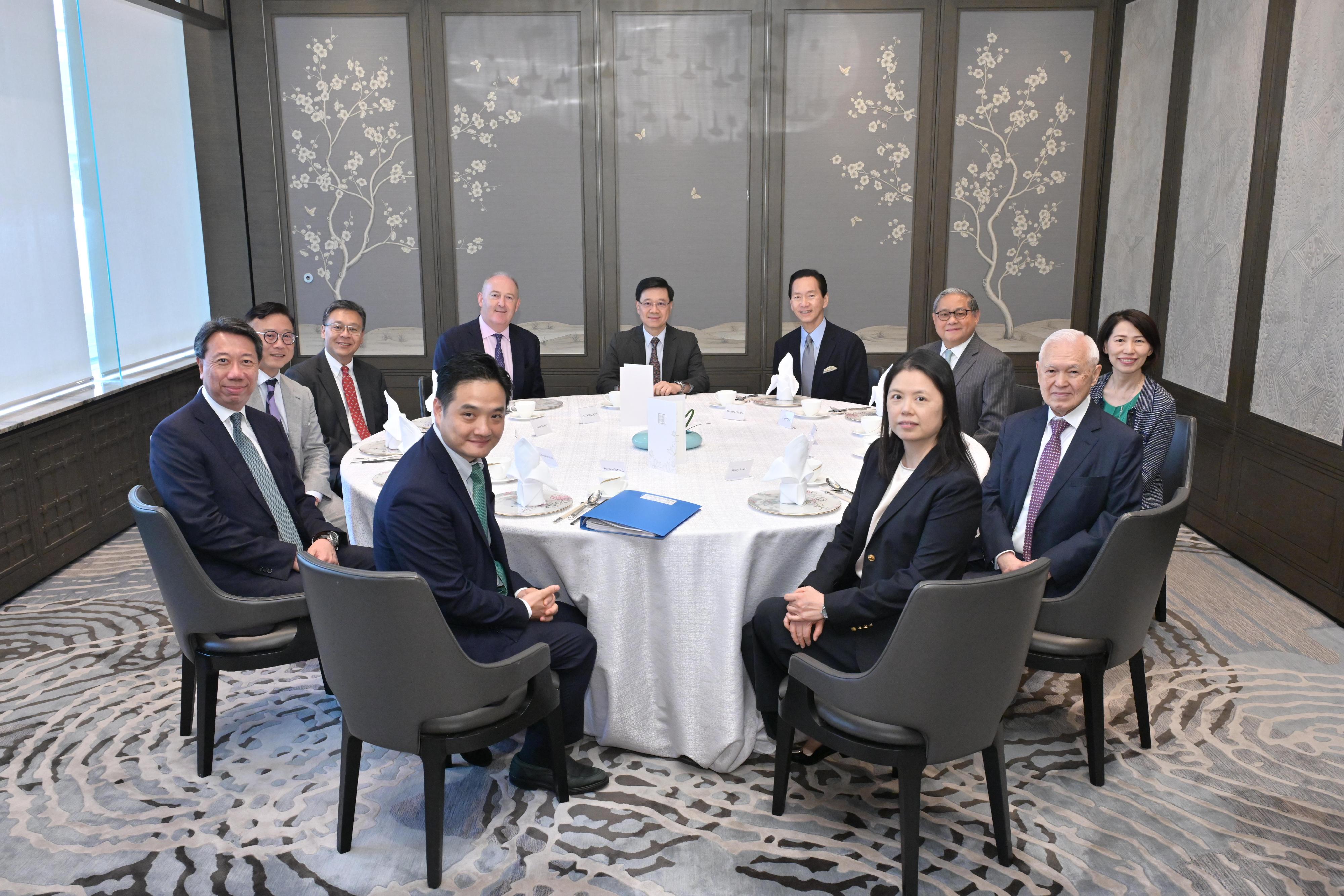 The Chief Executive, Mr John Lee, hosted the luncheon meetings of the Chief Executive's Council of Advisers (CECA) on July 22, July 23 and today (July 25) to listen to the views expressed by CECA members for the forthcoming Policy Address. Photo shows the session of regional and global collaborations.