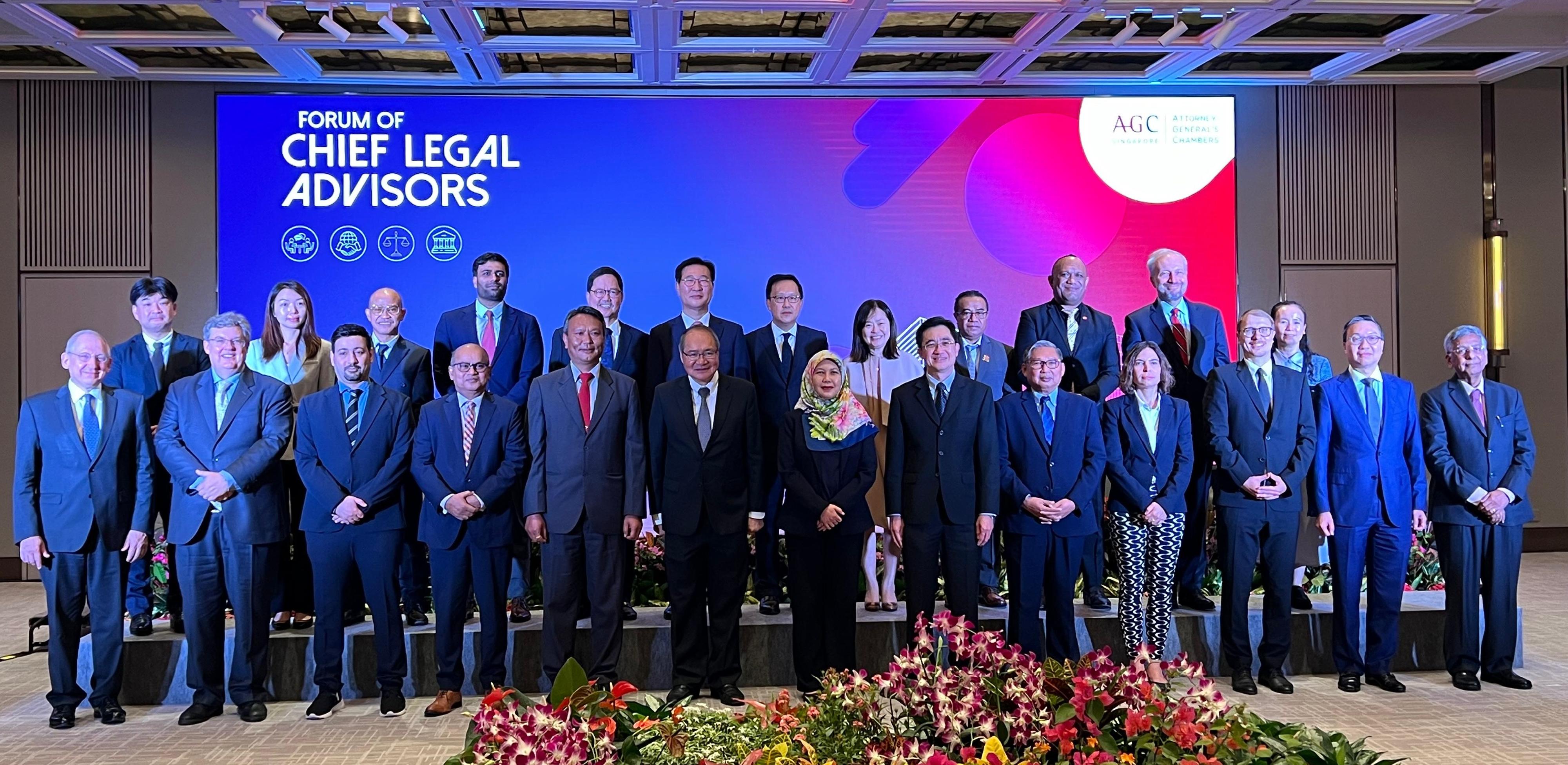 The Secretary for Justice, Mr Paul Lam, SC, continued his visit to Singapore on July 26 to attend the inaugural Forum of Chief Legal Advisors organised by the Attorney-General's Chambers of Singapore. Photo shows Mr Lam (first row, second right) with representatives from other jurisdictions before attending the roundtable sessions of the Forum.
