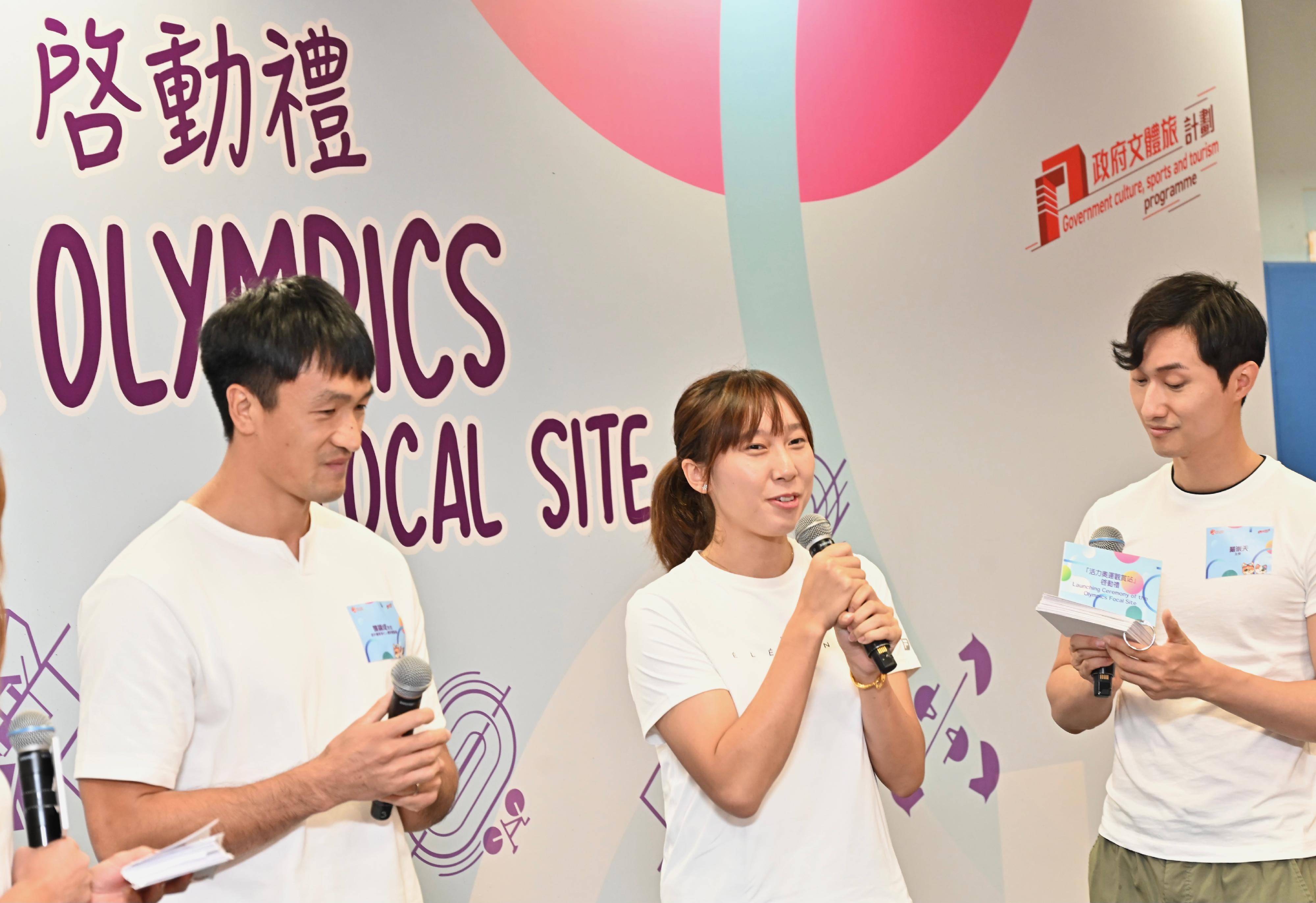 The Launching Ceremony of the Olympics Focal Site was held at the Secondary Hall of the Kowloon Park Sports Centre today (July 26). Photo shows Hong Kong table tennis athlete Minnie Soo (centre) and former member of the Hong Kong Men's Seven Salom Yiu (left) sharing their experiences on stage. 