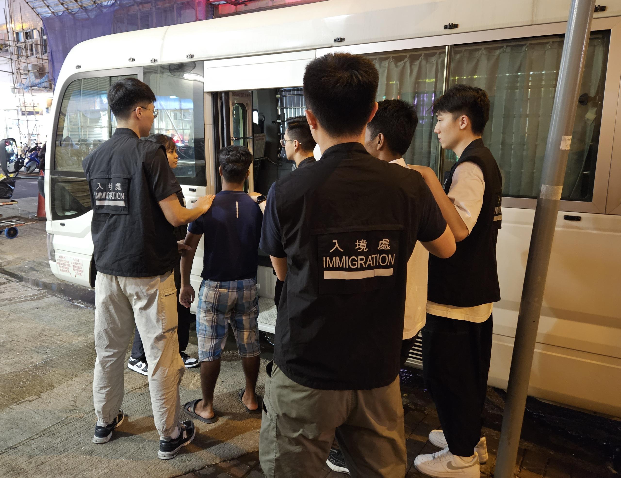 The Immigration Department mounted a series of territory-wide anti-illegal worker operations codenamed "Lightshadow" and "Twilight", and joint operations with the Hong Kong Police Force codenamed "Champion" and "Windsand", for four consecutive days from July 22 to yesterday (July 25). Photo shows suspected illegal workers arrested during an operation.