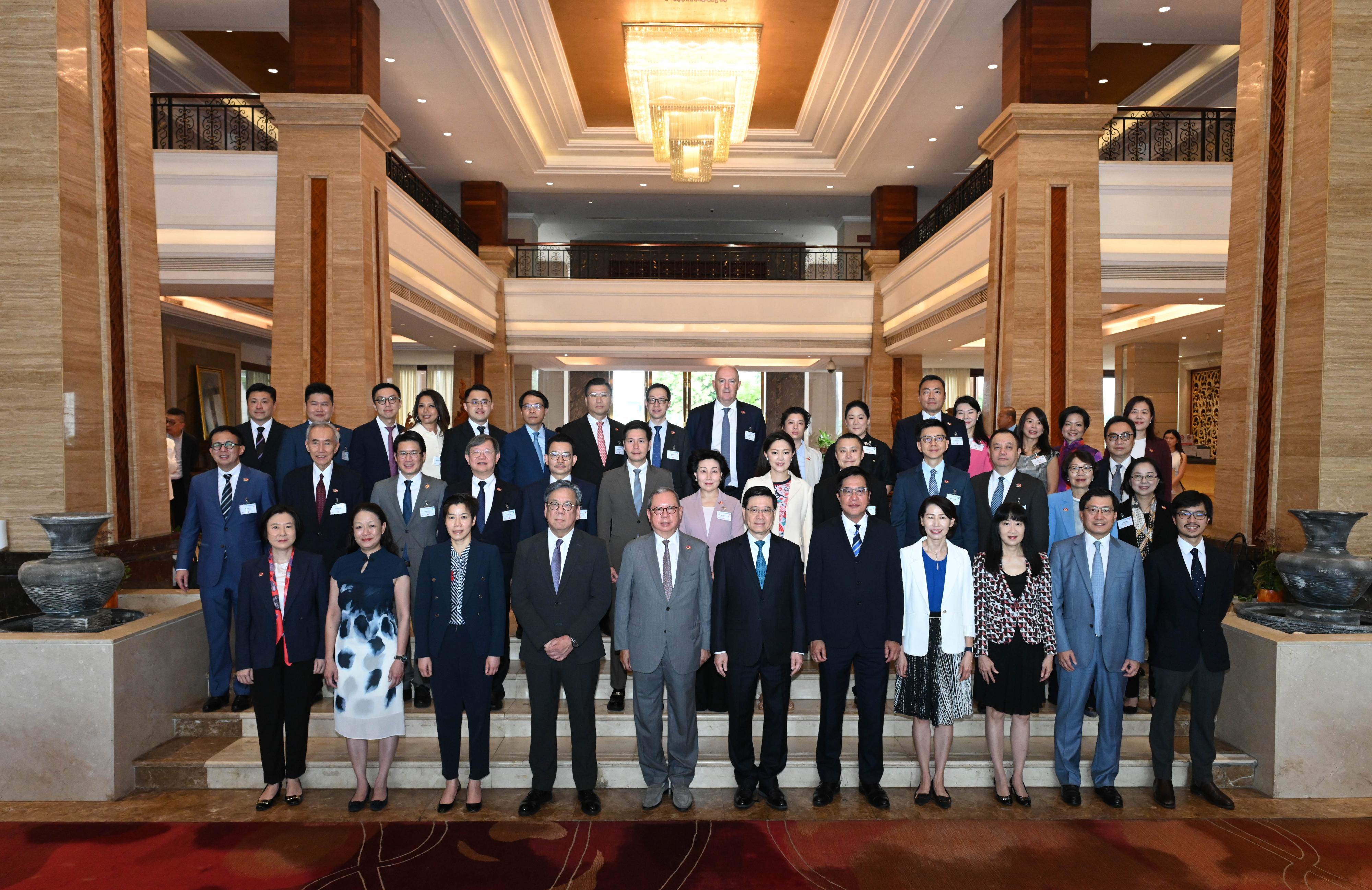 The Chief Executive, Mr John Lee, today (July 29) led a Hong Kong Special Administrative Region delegation to continue their visit in Vientiane, the capital of Laos. Photo shows (first row, from left) the Director-General of Investment Promotion, Ms Alpha Lau; the Director of Information Services, Mrs Apollonia Liu; the Commissioner of Customs and Excise, Ms Louise Ho; the Secretary for Commerce and Economic Development, Mr Algernon Yau; the Chairman of the Hong Kong Trade Development Council (HKTDC), Dr Peter Lam; Mr Lee; the Deputy Financial Secretary, Mr Michael Wong; the Director of the Chief Executive's Office, Ms Carol Yip; the Executive Director of the HKTDC, Ms Margaret Fong; the Chairman of the Airport Authority Hong Kong, Mr Fred Lam; the Commissioner for Belt and Road, Mr Nicholas Ho; and the members of the delegation.