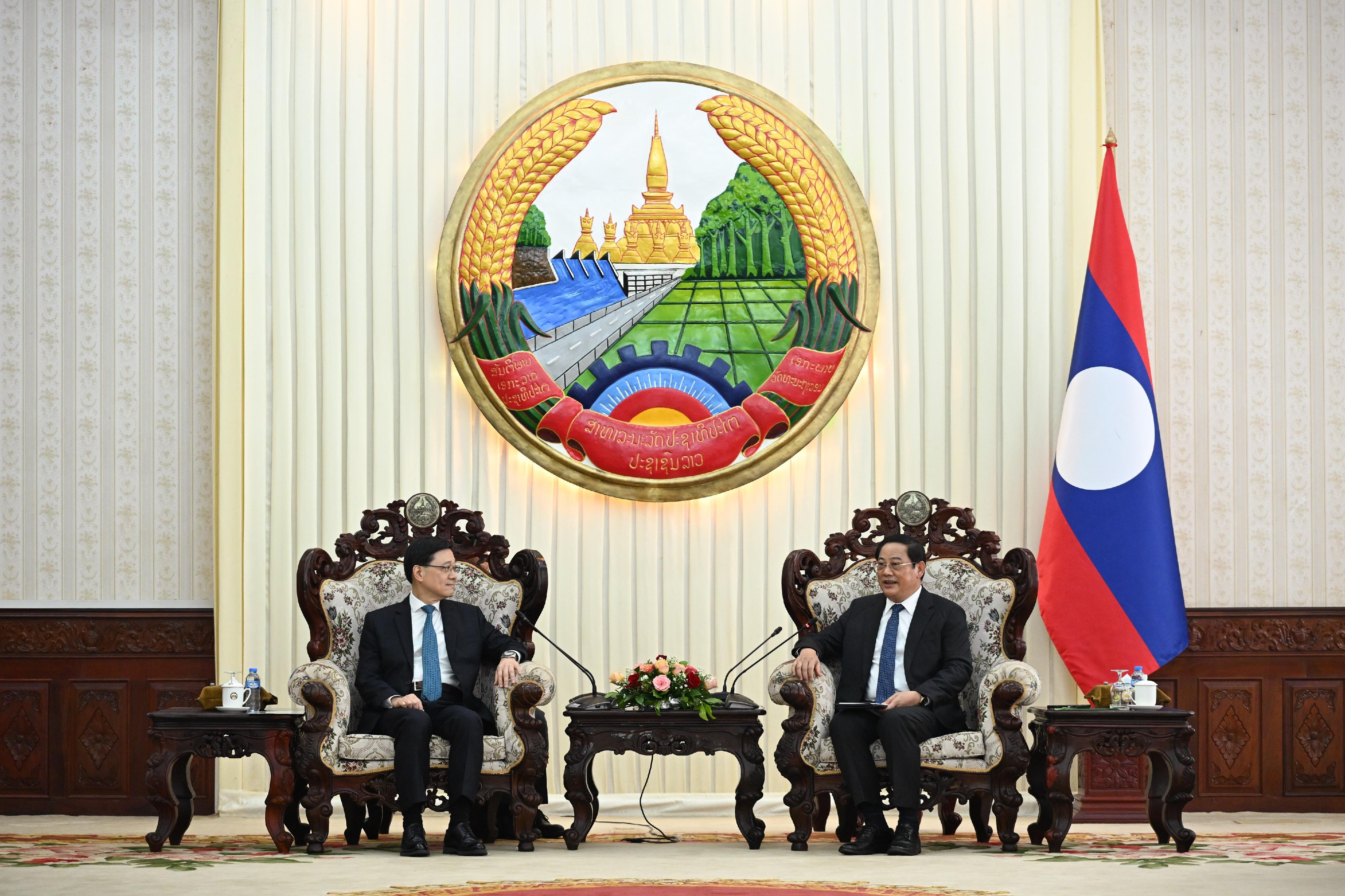 The Chief Executive, Mr John Lee, today (July 29) led a Hong Kong Special Administrative Region delegation to continue their visit in Vientiane, the capital of Laos. Photo shows Mr Lee (left) meeting with the Lao Prime Minister, Mr Sonexay Siphandone (right).

