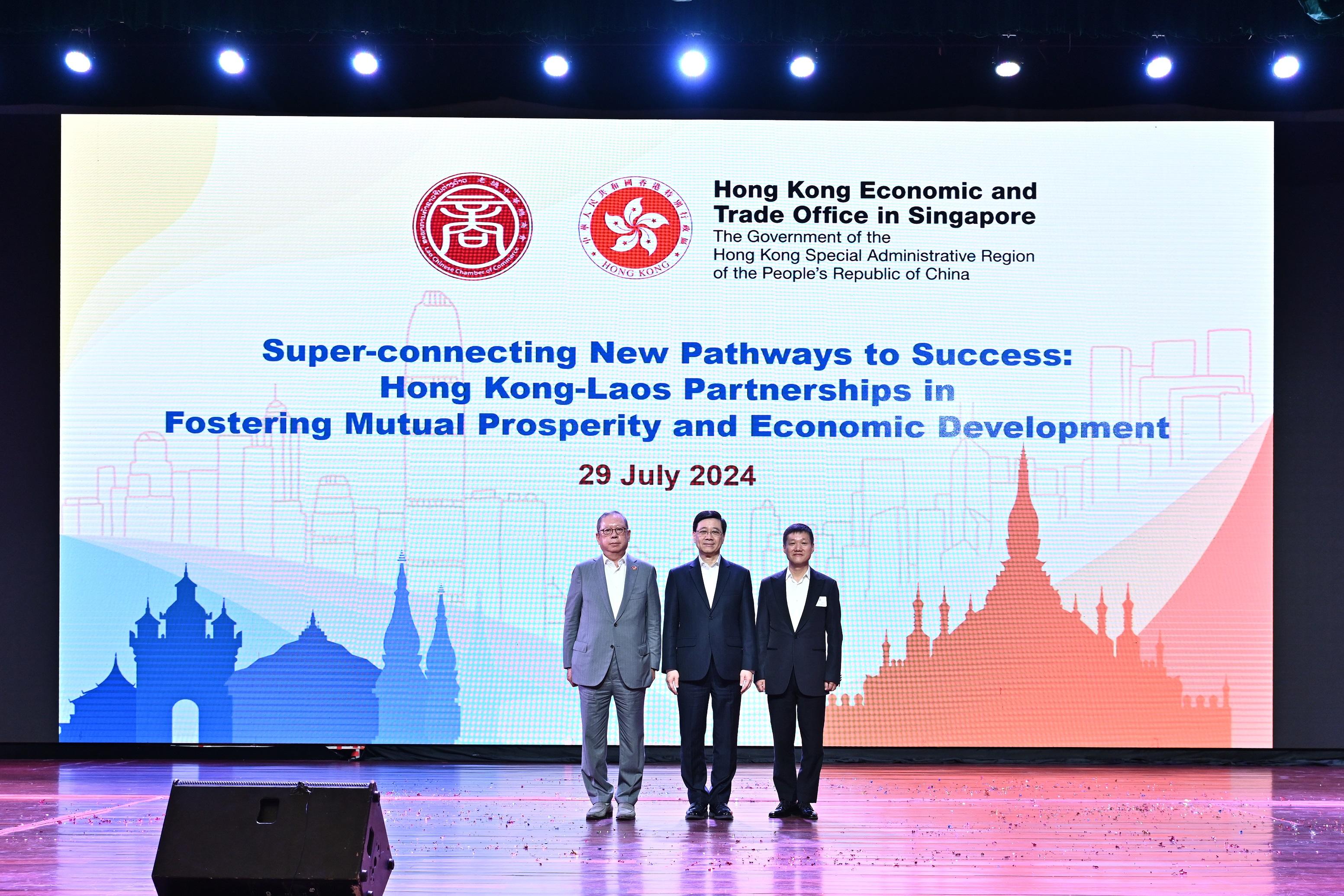 The Chief Executive, Mr John Lee, today (July 29) led a Hong Kong Special Administrative Region delegation to continue their visit in Vientiane, the capital of Laos. Photo shows (from left) the Chairman of the Hong Kong Trade Development Council, Dr Peter Lam; Mr Lee, and the Chairman of the Lao Chinese Chamber of Commerce, Mr Yao Bin.
