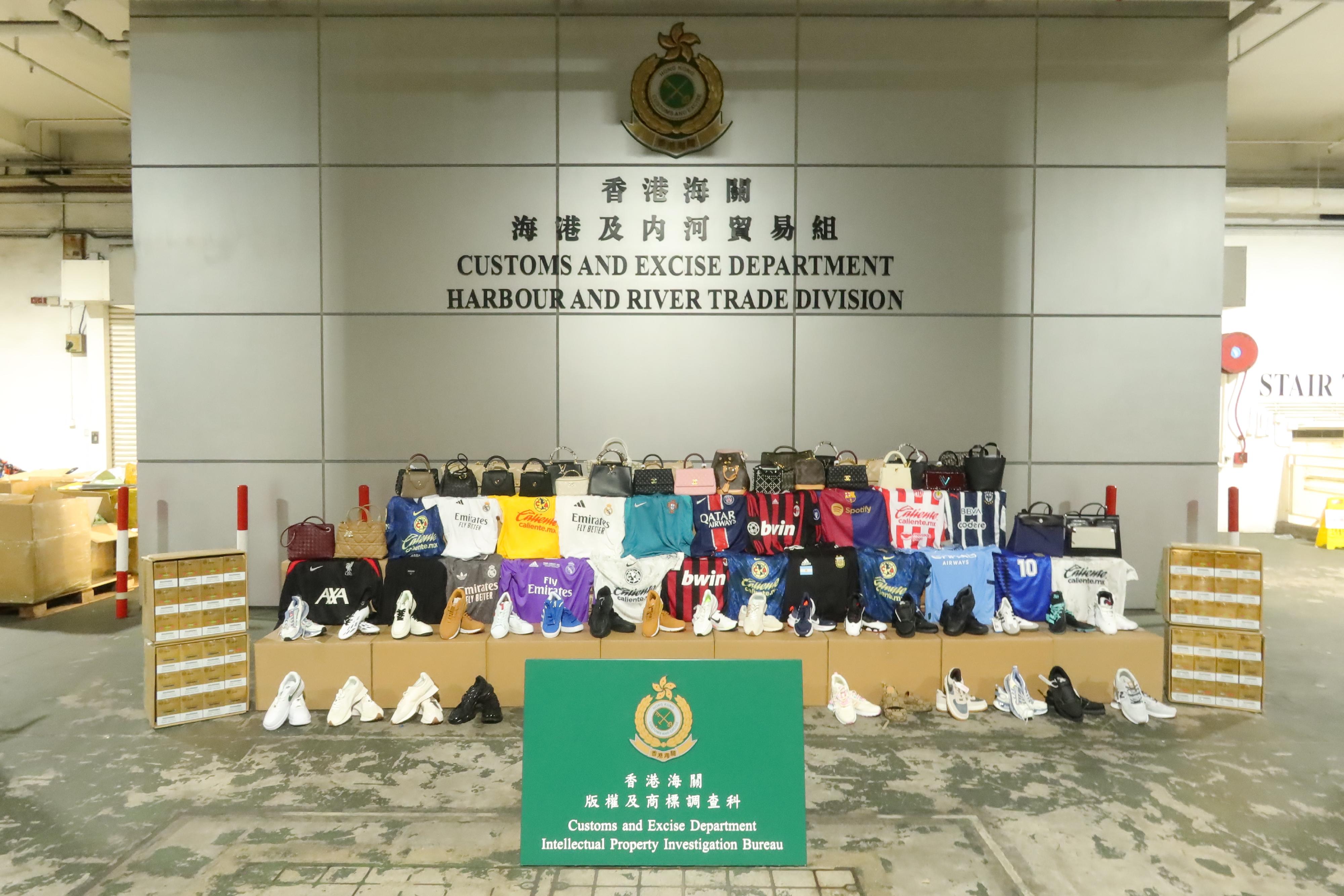 Hong Kong Customs on July 15 seized about 6 300 suspected counterfeit goods and about 5 000 suspected alternative smoking products at the Tuen Mun River Trade Terminal Customs Cargo Examination Compound. The total estimated market value was about $1.2 million. Photo shows the suspected counterfeit goods and suspected alternative smoking products seized.