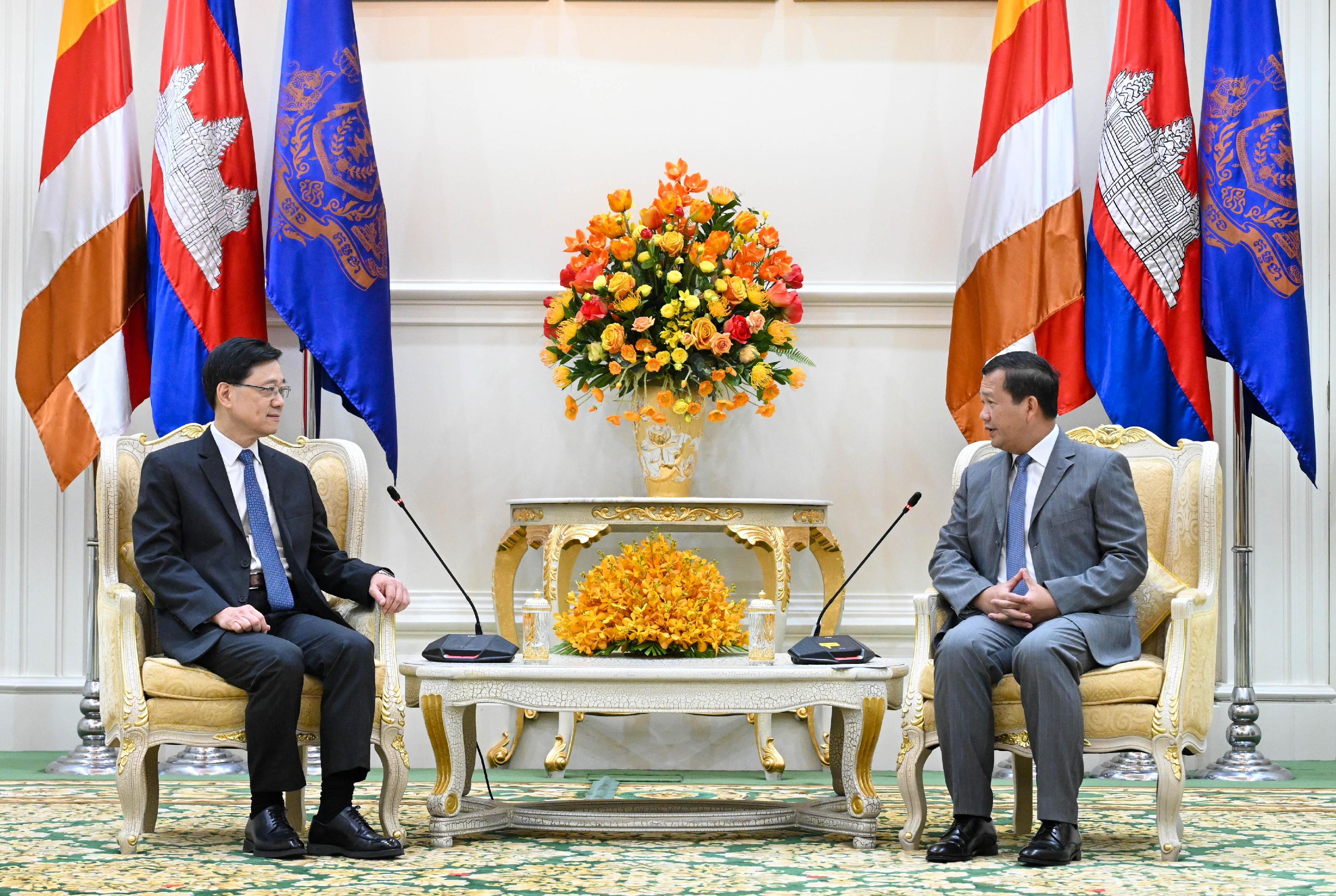 The Chief Executive, Mr John Lee (left), meets with the Prime Minister of Cambodia, Mr Hun Manet (right), in Cambodia today (July 31).