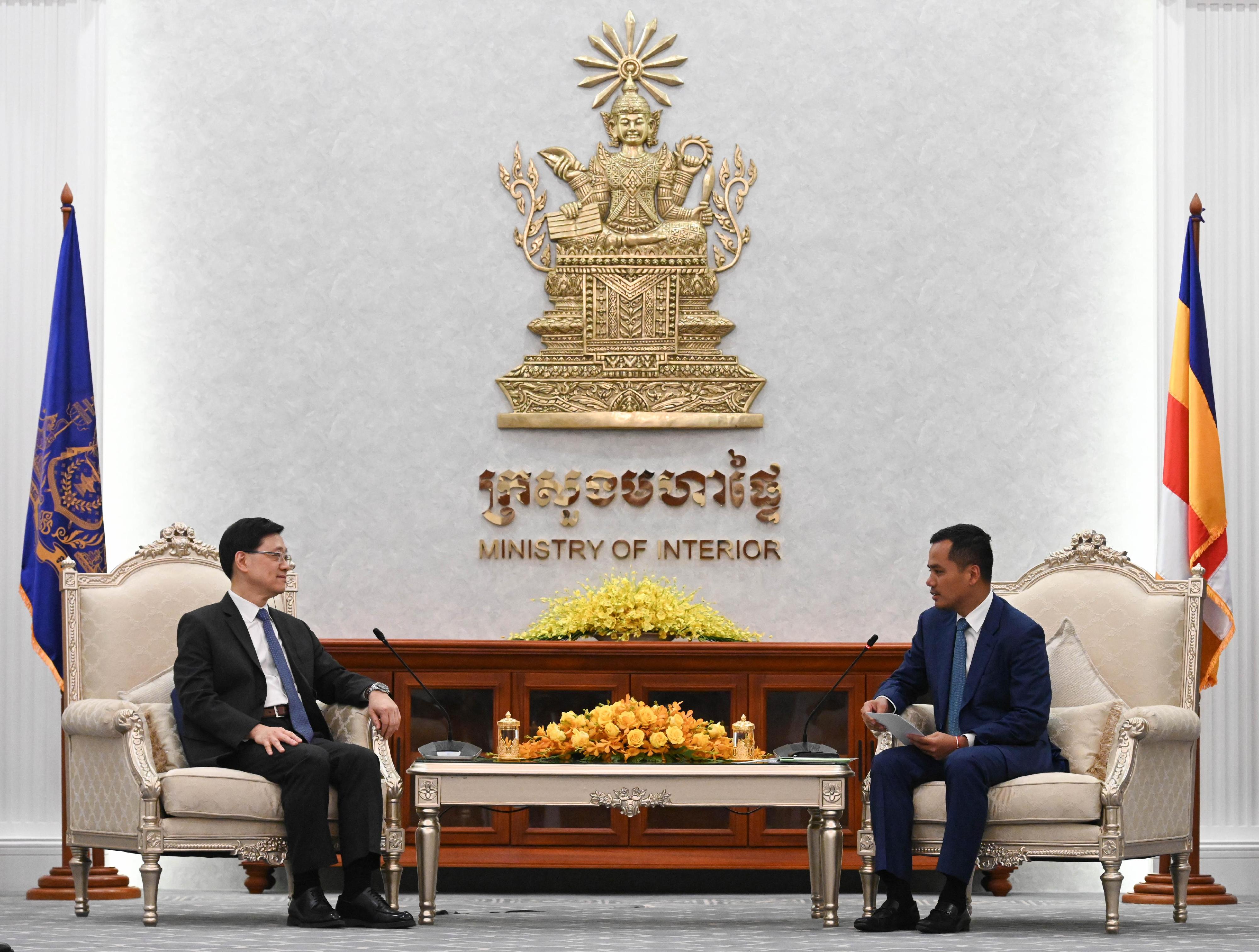 The Chief Executive, Mr John Lee (left), meets with the Deputy Prime Minister and Minister of Interior of Cambodia, Mr Sar Sokha (right), in Cambodia today (July 31).