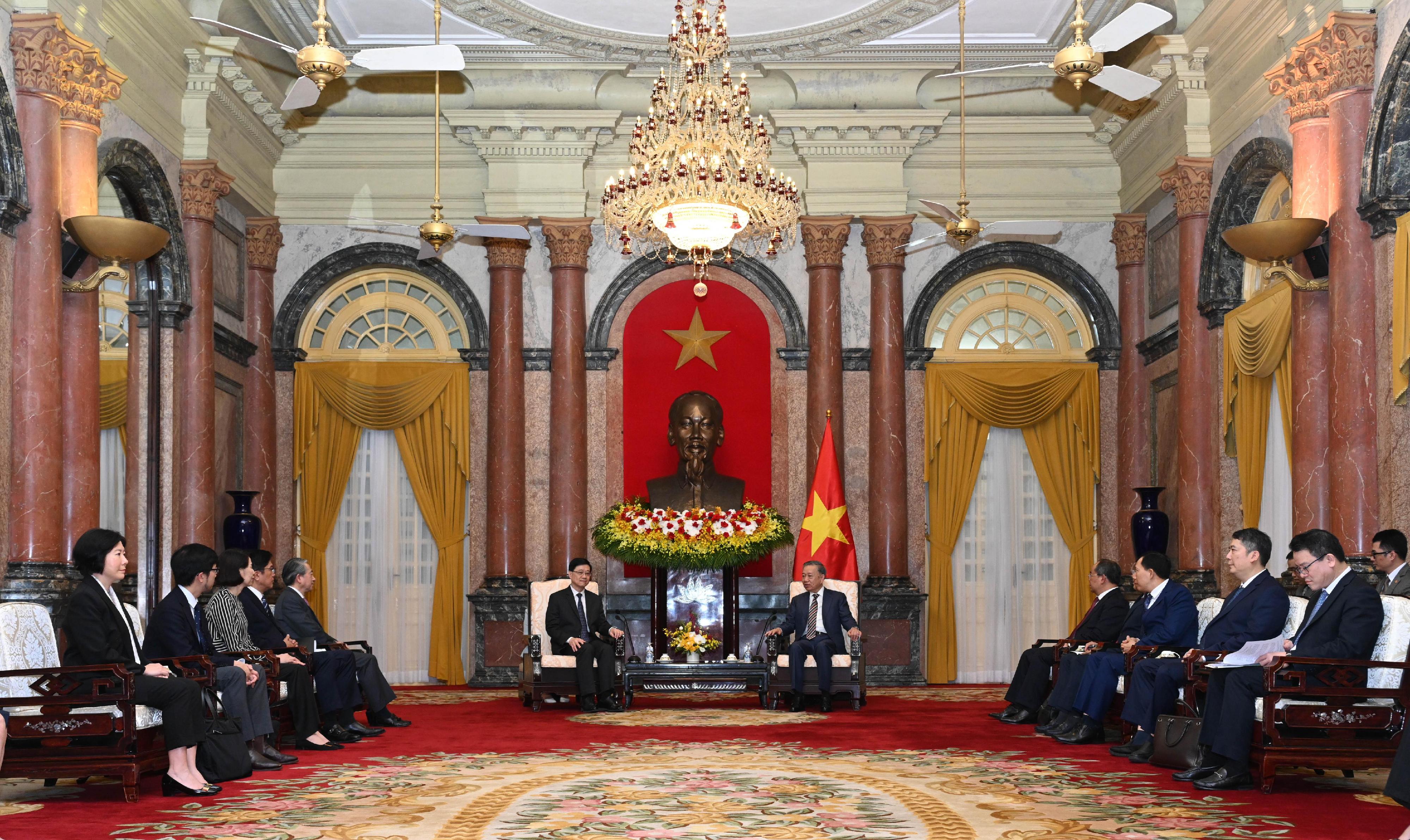 The Chief Executive, Mr John Lee, led a Hong Kong Special Administrative Region delegation to Hanoi, Vietnam, and continued his visit programme there today (August 1). Photo shows Mr Lee (sixth left) meeting with the President of Vietnam, Mr To Lam (fifth right). Also present were the Ambassador Extraordinary and Plenipotentiary of the People's Republic of China to the Socialist Republic of Vietnam, Mr Xiong Bo (fifth left); the Deputy Financial Secretary, Mr Michael Wong (fourth left) and other government officials.