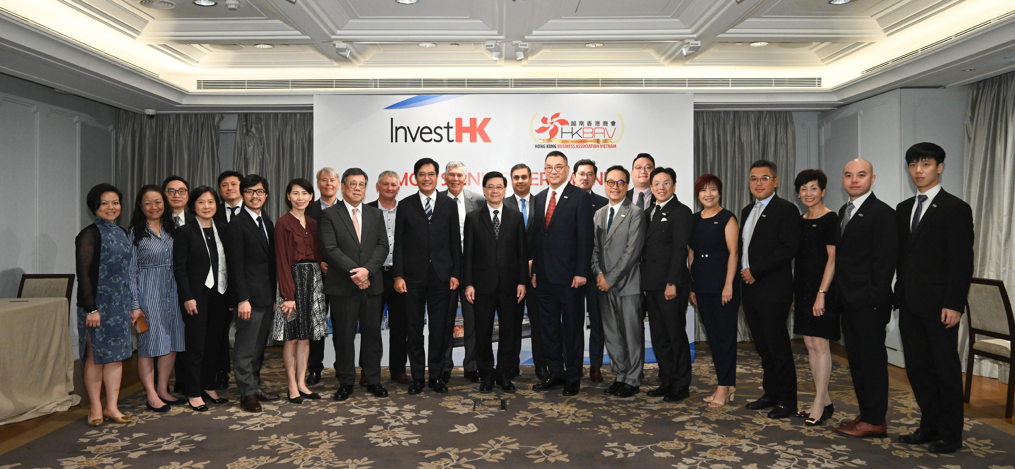 The Chief Executive, Mr John Lee, led a Hong Kong Special Administrative Region delegation to Ho Chi Minh City, Vietnam, and continued his last-day visit programme to three member states of the Association of Southeast Asian Nations today (August 2). Photo shows (front row, from sixth left) the Secretary for Commerce and Economic Development, Mr Algernon Yau; the Deputy Financial Secretary, Mr Michael Wong; Mr Lee; and the delegation members with representatives of the Hong Kong Business Association Vietnam.
