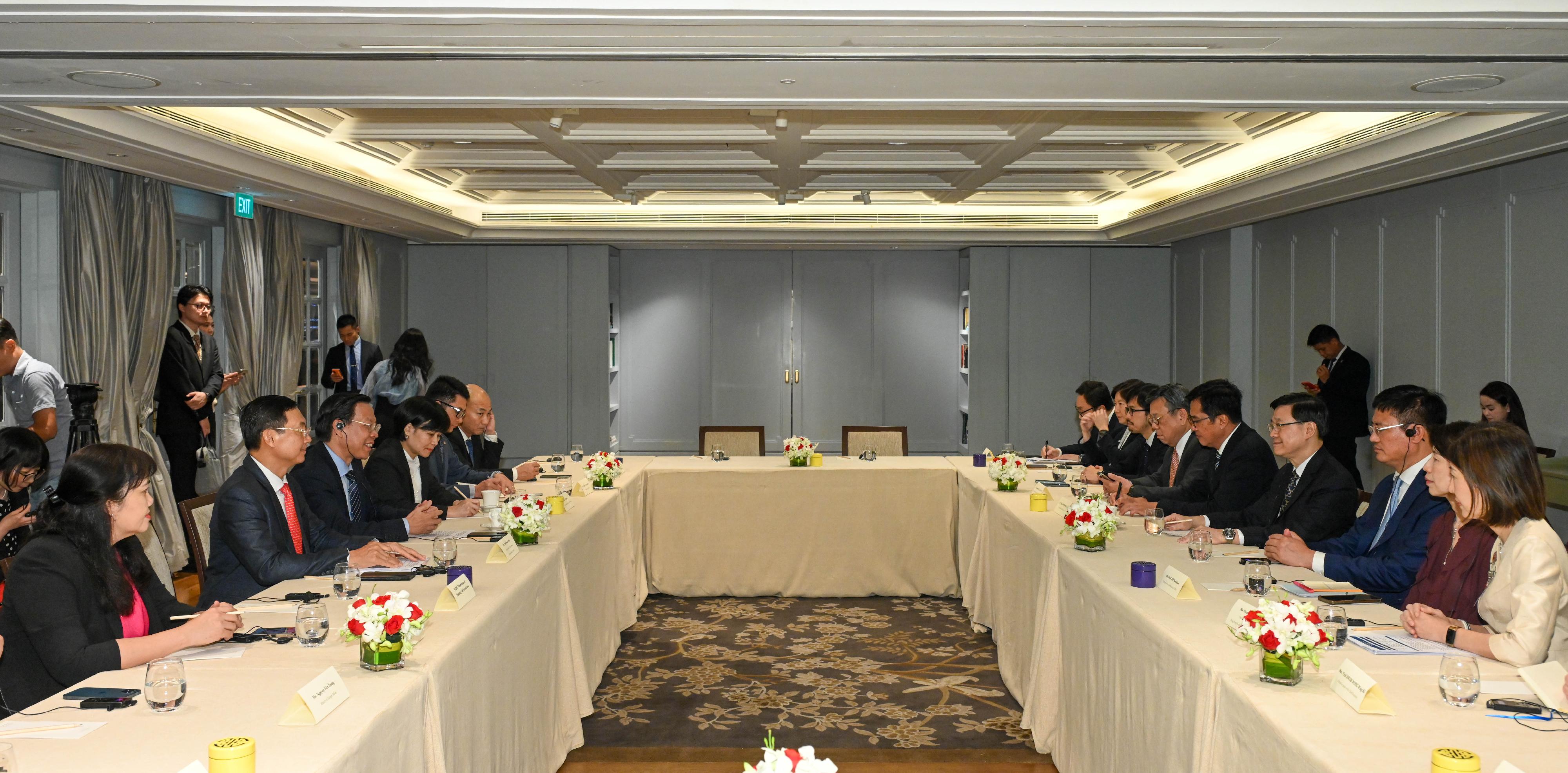 The Chief Executive, Mr John Lee, led a Hong Kong Special Administrative Region delegation to Ho Chi Minh City, Vietnam, as he continued the last day of his visit programme to three member states of the Association of Southeast Asian Nations today (August 2). Photo shows Mr Lee (fourth right) meeting with the Chairman of the People's Committee of Ho Chi Minh City, Mr Phan Van Mai (third left). Present were the Deputy Financial Secretary, Mr Michael Wong (fifth right), the Secretary for Commerce and Economic Development, Mr Algernon Yau (sixth right), and the delegation members.