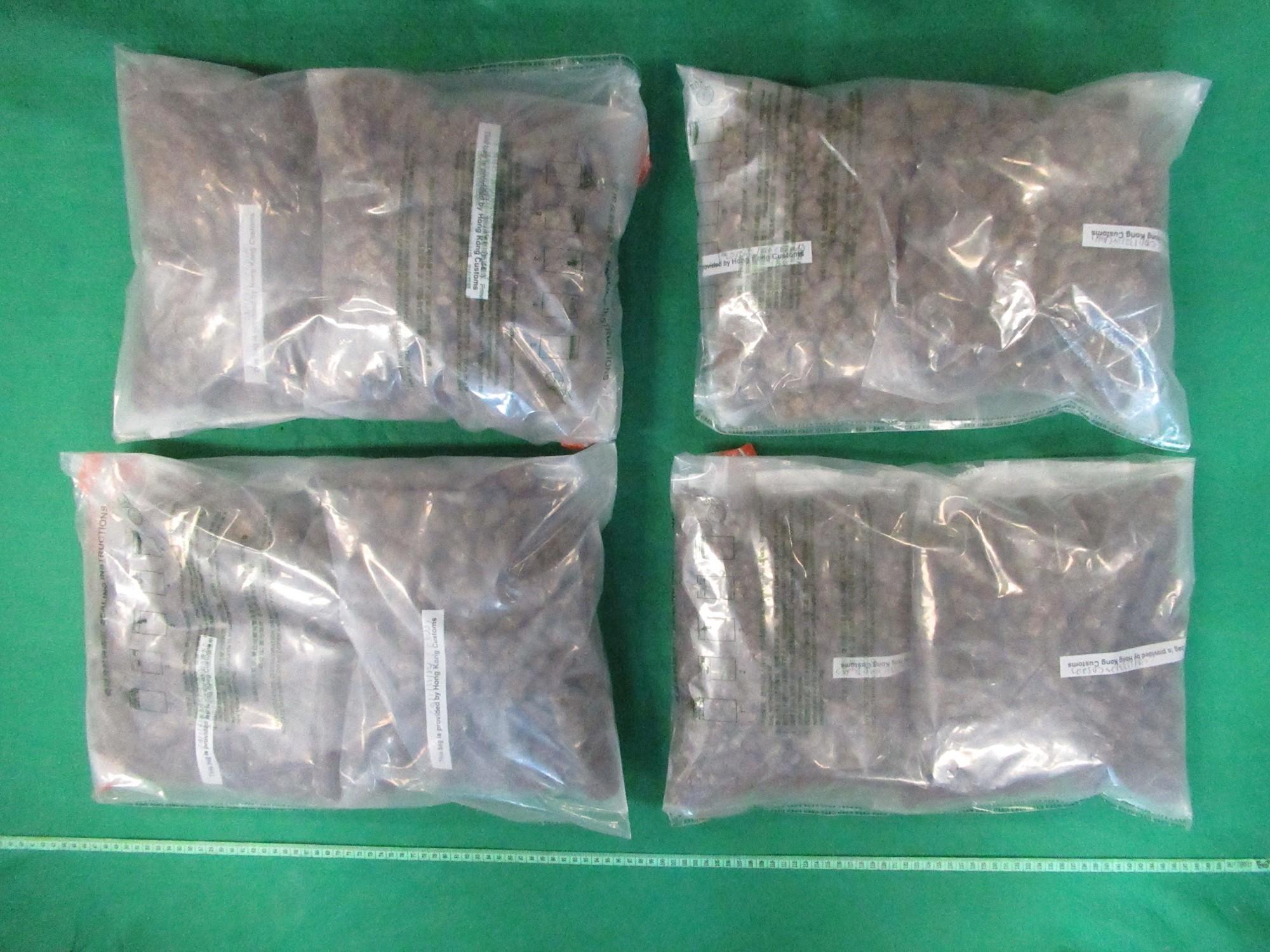 Hong Kong Customs yesterday (August 6) seized about 4.5 kilograms of suspected cannabis buds with an estimated market value of about $1.2 million in Hung Hom and Jordan.  Photo shows the suspected cannabis buds seized.