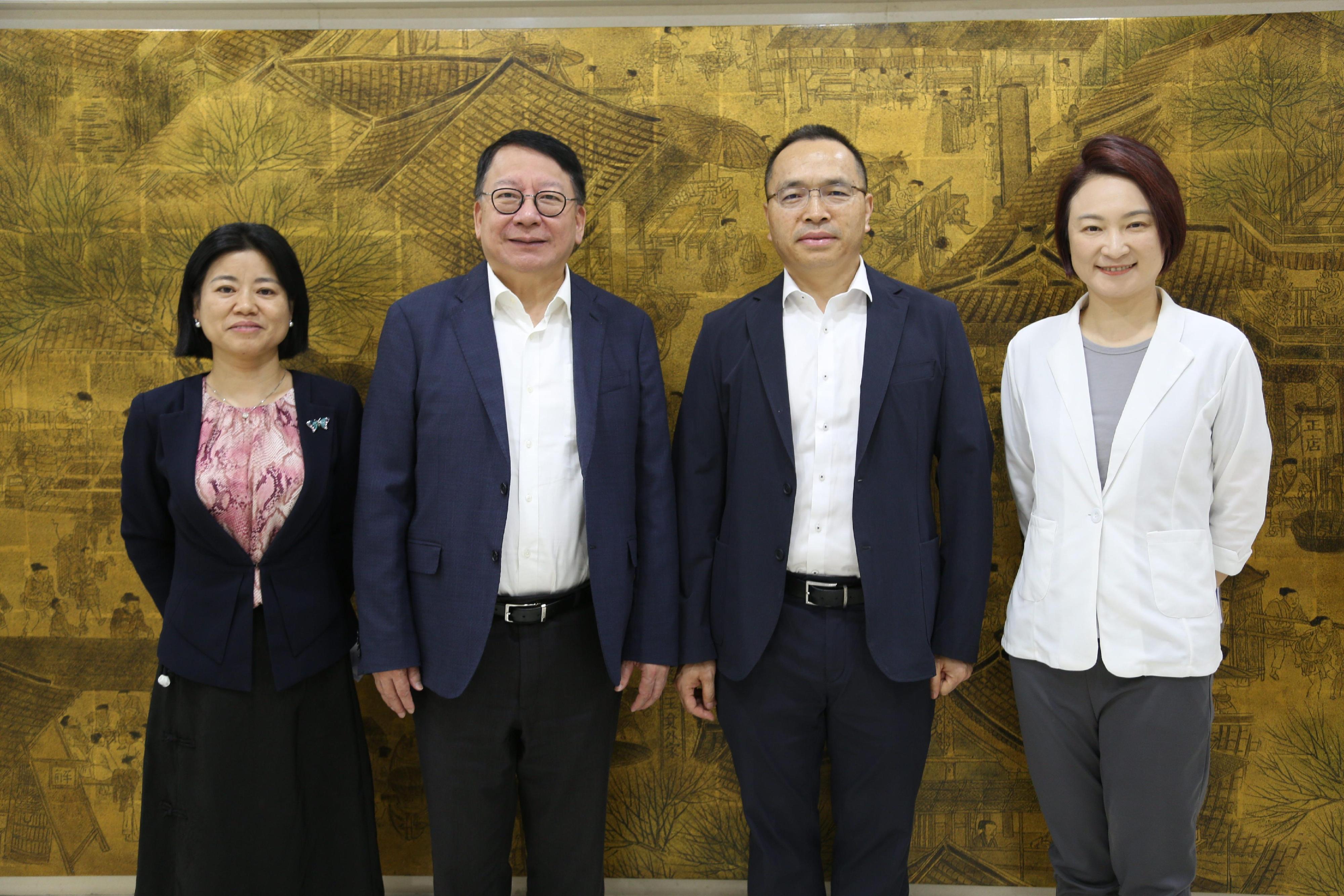 The Chief Secretary for Administration, Mr Chan Kwok-ki, and the Convenor of the Working Group on Patriotic Education, Ms Starry Lee, met with the Director of the Office of Hong Kong, Macao and Taiwan Affairs and Director of the Department of International Cooperation and Exchanges of the Ministry of Education, Mr Yang Dan, on August 8 during their visit in Beijing to exchange views on taking forward patriotic education at schools in Hong Kong and on the Mainland. Photo shows Mr Chan (second left), Ms Lee (first right) and Mr Yang (second right).