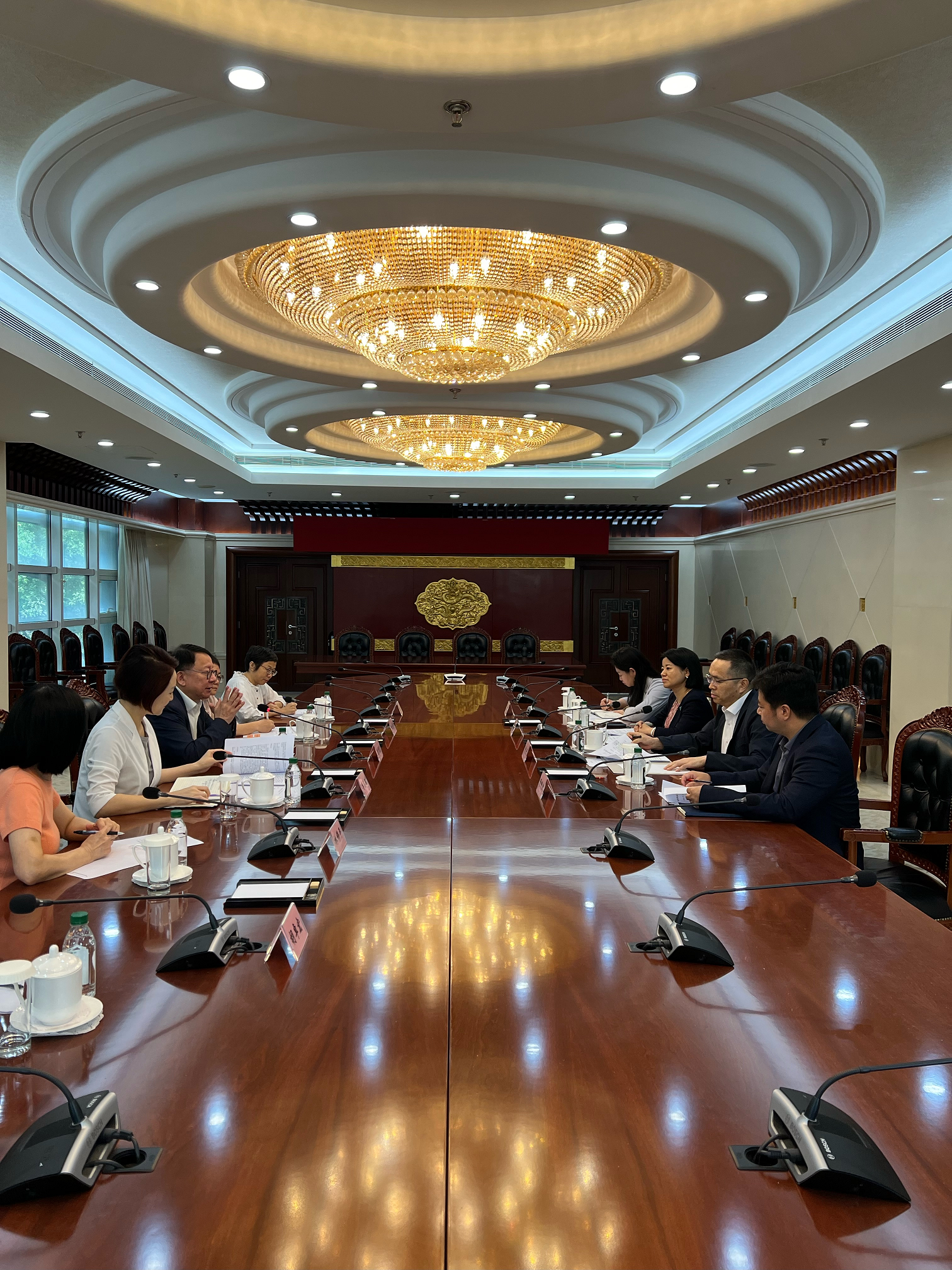 The Chief Secretary for Administration, Mr Chan Kwok-ki (third left), and the Convenor of the Working Group on Patriotic Education, Ms Starry Lee (second left), met with the Director of the Office of Hong Kong, Macao and Taiwan Affairs and Department of International Cooperation and Exchanges of the Ministry of Education, Mr Yang Dan (second right), on August 8 during their visit in Beijing to exchange views on taking forward patriotic education at schools in Hong Kong and on the Mainland.