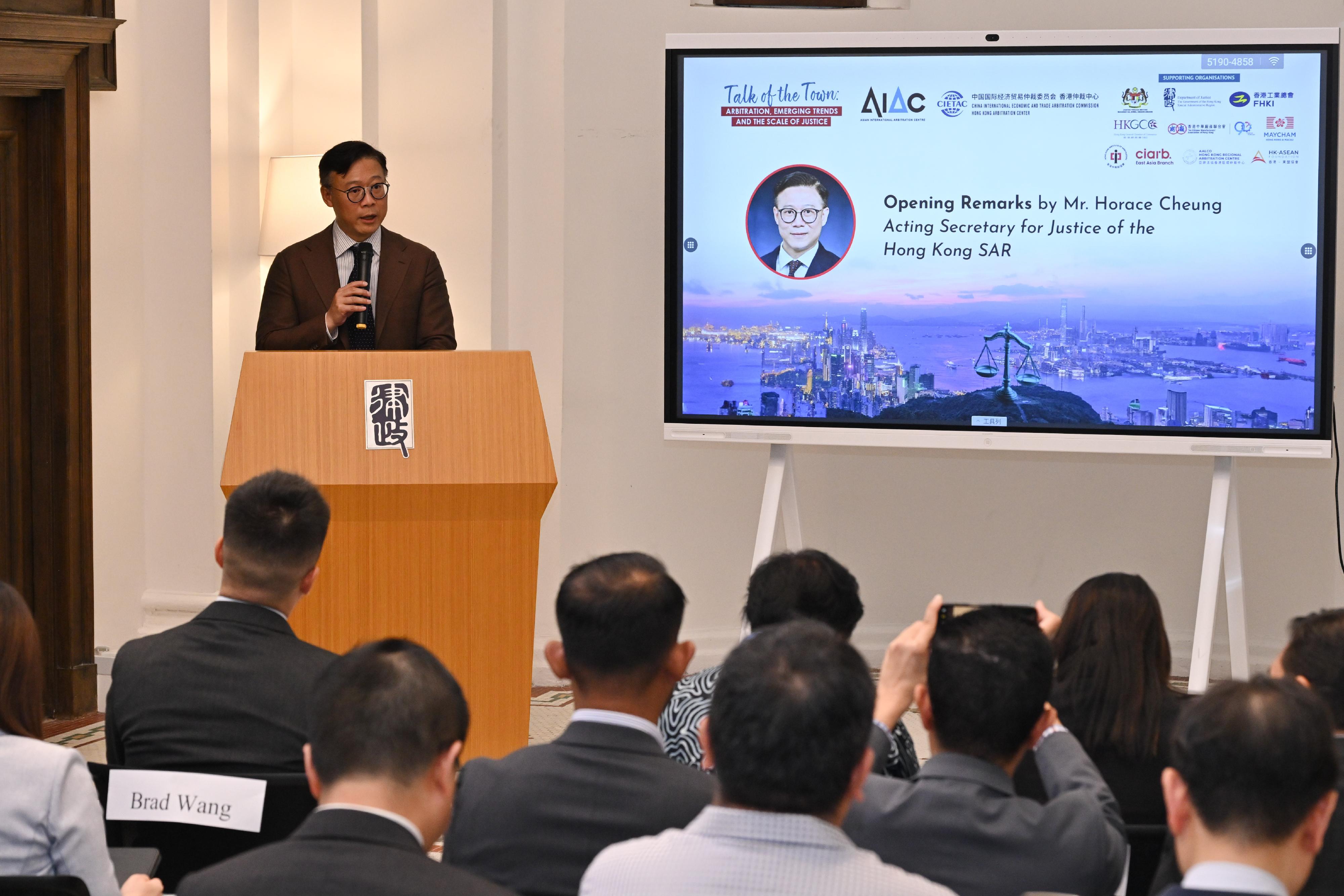 The Acting Secretary for Justice, Mr Cheung Kwok-kwan, speaks at the event Talk of the Town: Arbitration, Emerging Trends and the Scale of Justice organised by the China International Economic and Trade Arbitration Commission Hong Kong Arbitration Center and Asian International Arbitration Centre today (August 9).

