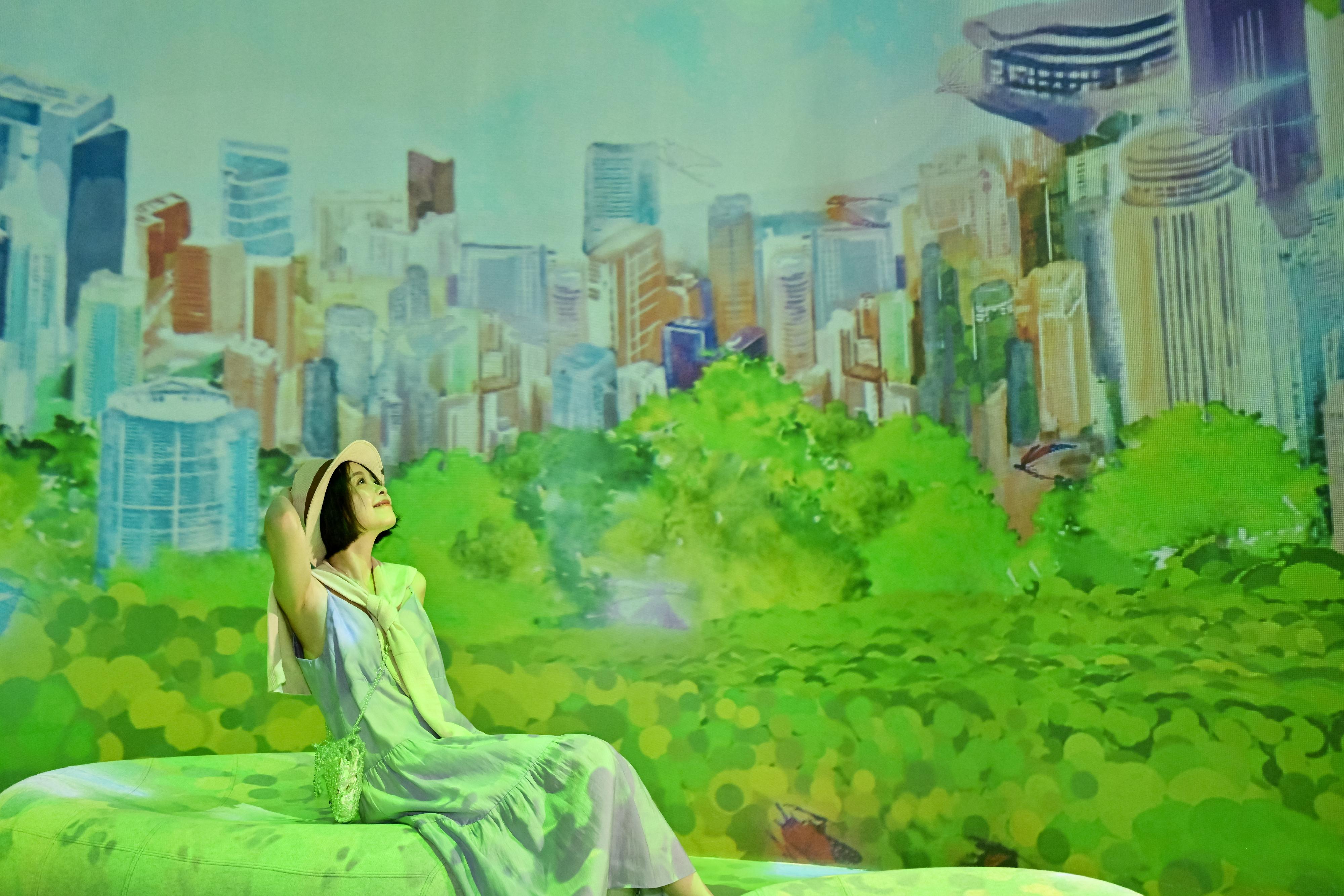 The "Immersive Hong Kong" roving exhibition, which showcases Hong Kong's new attractions, advantages and opportunities with art technology, opened in Guangzhou today (August 9) as one of the Hong Kong Special Administrative Region Government's promotional events in the Guangdong-Hong Kong-Macao Greater Bay Area. Photo shows an art projection with the theme "Diversity and Greenery" at the exhibition.