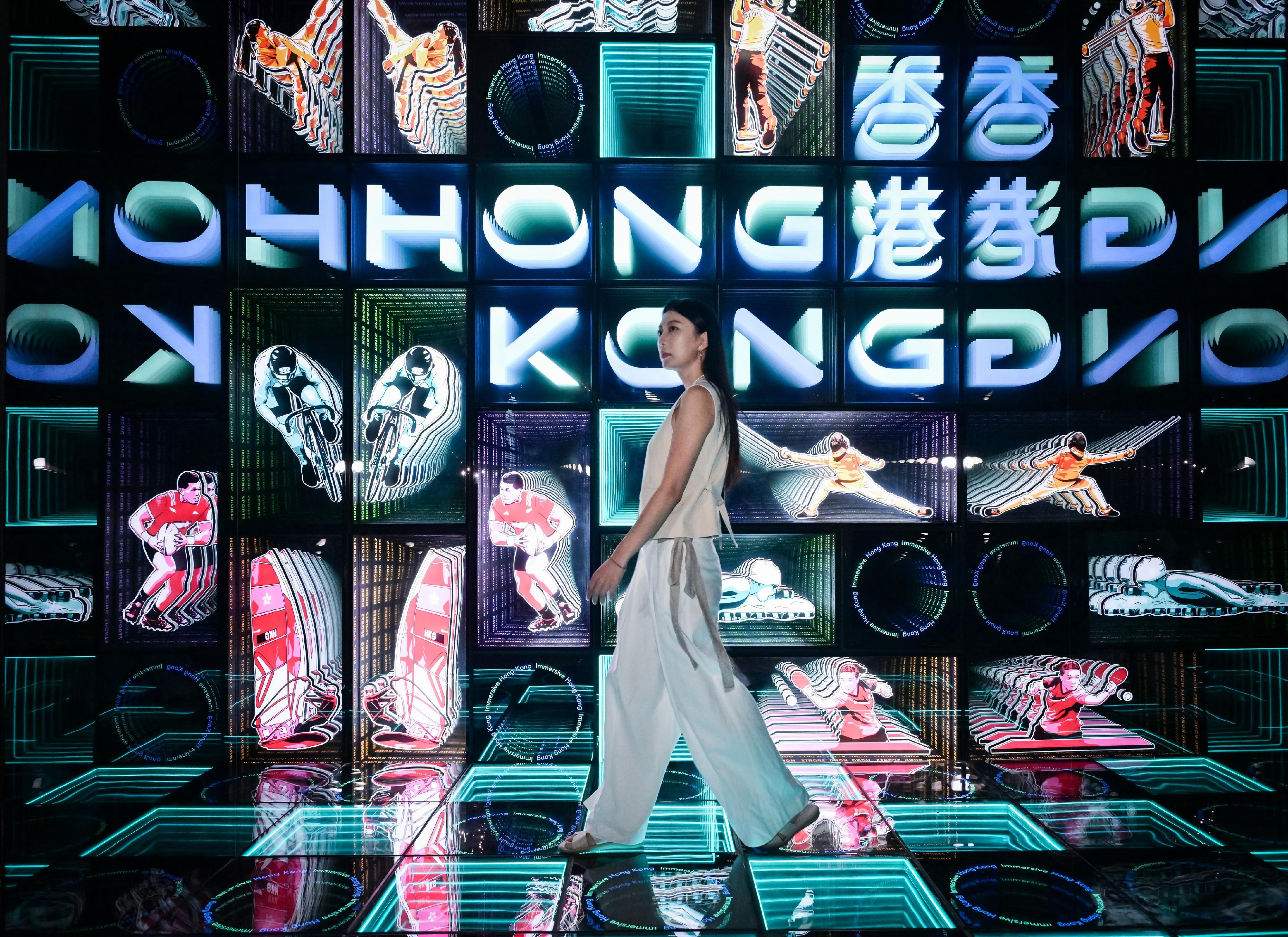 The "Immersive Hong Kong" roving exhibition, which showcases Hong Kong's new attractions, advantages and opportunities with art technology, opened in Guangzhou today (August 9) as one of the Hong Kong Special Administrative Region Government's promotional events in the Guangdong-Hong Kong-Macao Greater Bay Area. Photo shows the light box installation with the theme "Buzzing Sports Action" at the exhibition.