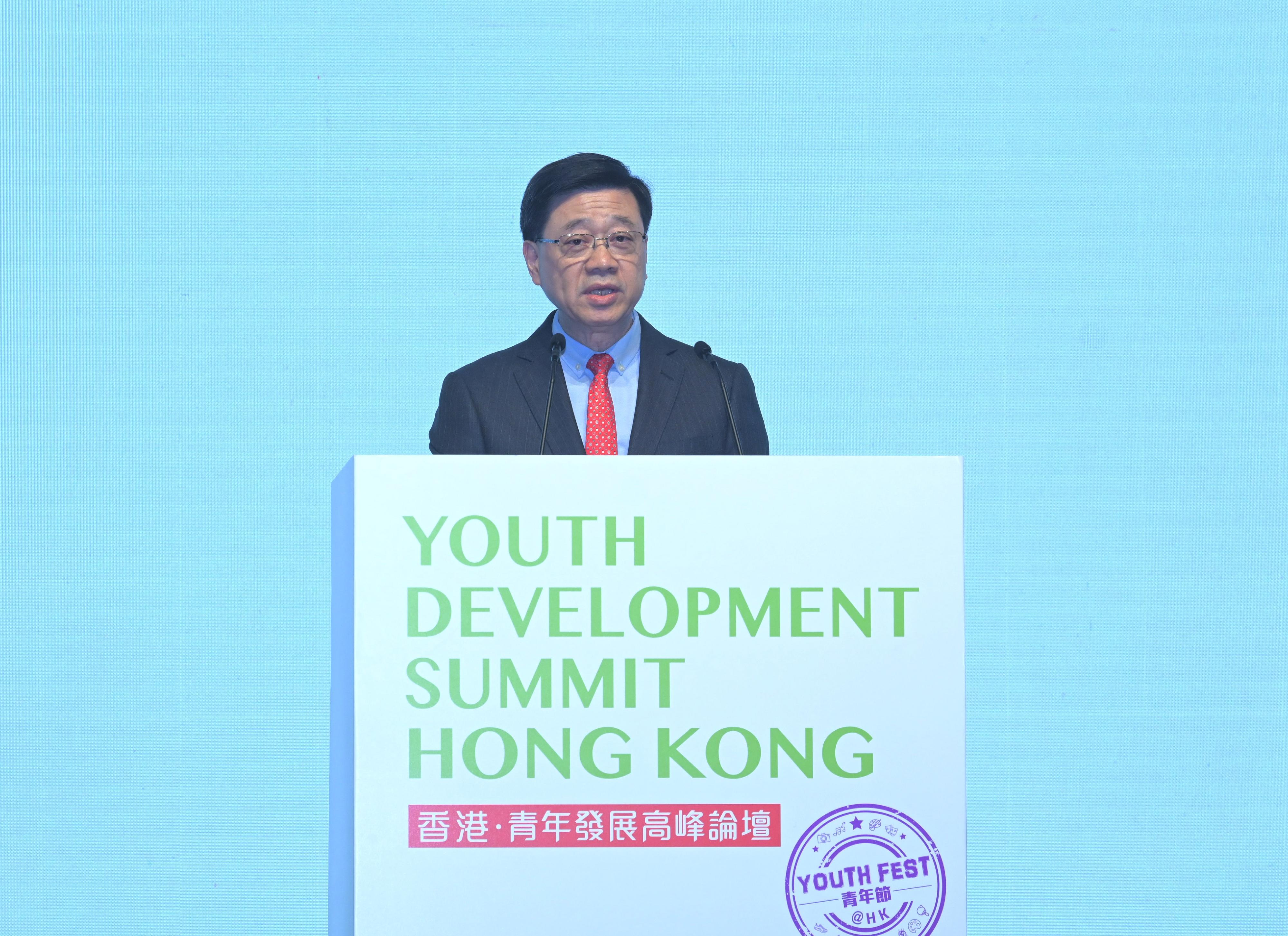 The Chief Executive, Mr John Lee, speaks at the Youth Development Summit today (August 10).