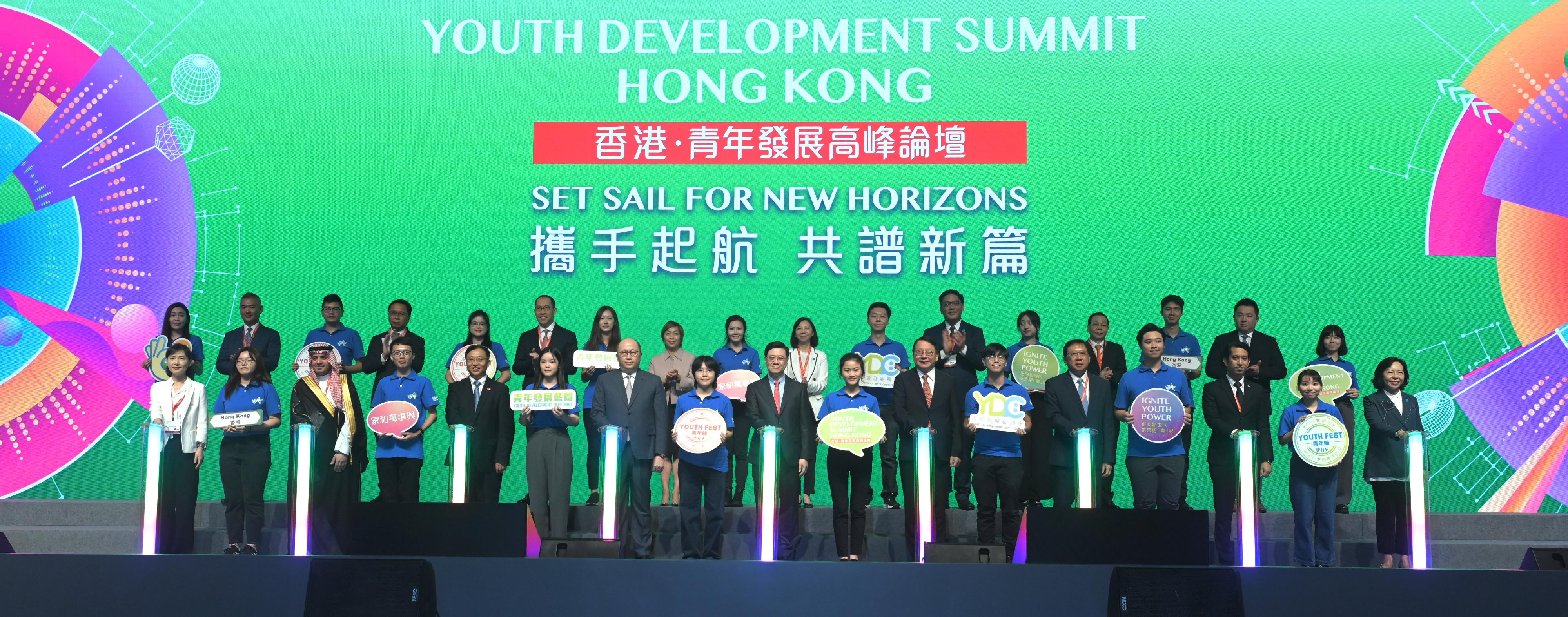 The Chief Executive, Mr John Lee, attended the Youth Development Summit today (August 10). Photo shows Mr Lee (front row, centre); the Director of the Liaison Office of the Central People's Government in the Hong Kong Special Administrative Region (HKSAR), Mr Zheng Yanxiong (front row, seventh left); the Chief Secretary for Administration, Mr Chan Kwok-ki (front row, seventh right); the Commissioner of the Ministry of Foreign Affairs in the HKSAR, Mr Cui Jianchun (front row, fifth left); the Secretary for Home and Youth Affairs, Miss Alice Mak (front row, first right); Deputy Minister of Education and Sports of Lao People's Democratic Republic Mr Kingmano Phommahaxay (front row, fifth right); Deputy Minister for Society Development of the Ministry of Human Resources and Social Development of the Kingdom of Saudi Arabia Mr Ahmed Al-Majed (front row, third left); and Deputy Minister of Youth and Sports of Malaysia Mr Adam Adli Abd Halim (front row, third right), with other guests and youth representatives at the Summit.