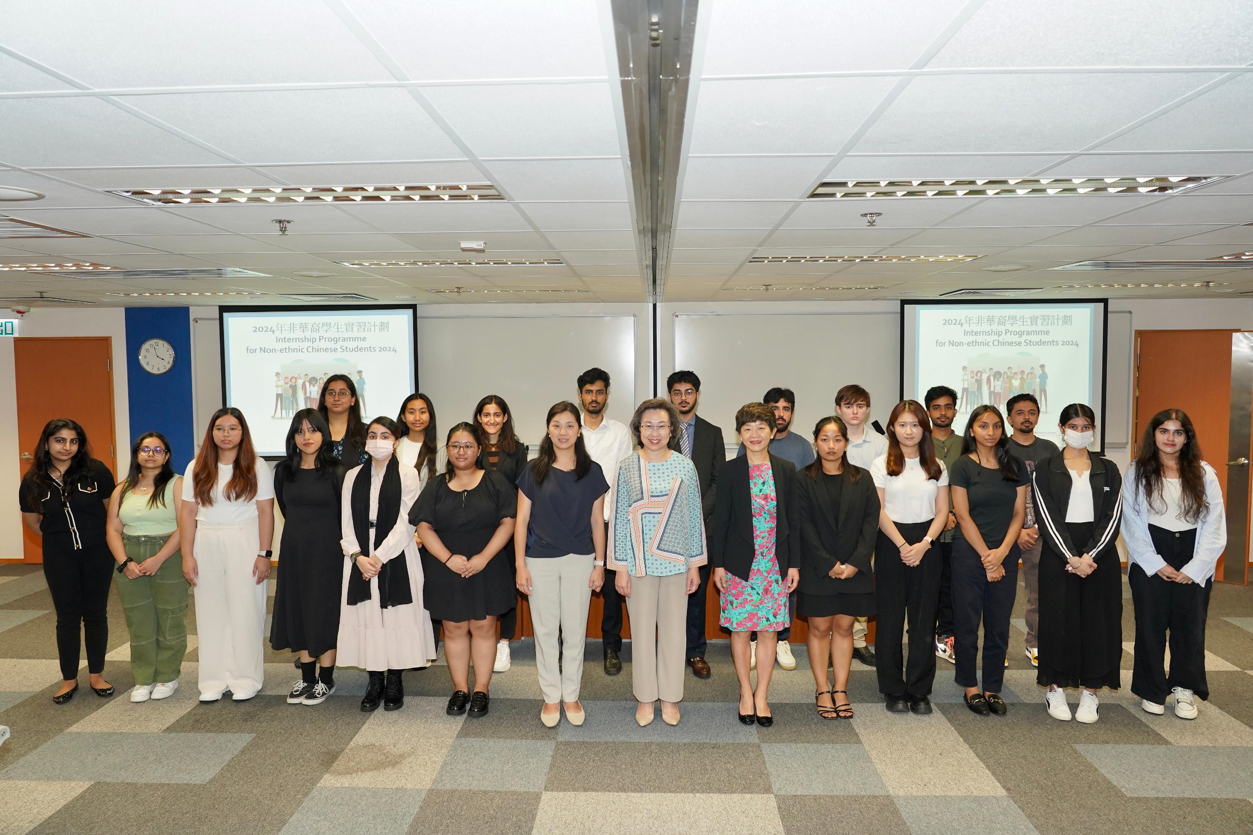 The Secretary for the Civil Service, Mrs Ingrid Yeung, attended a sharing session on the Internship Programme for Non-ethnic Chinese Students today (August 12) to listen to the students sharing their internship experiences and takeaways. Photo shows Mrs Yeung (front row, seventh right) with the interns.