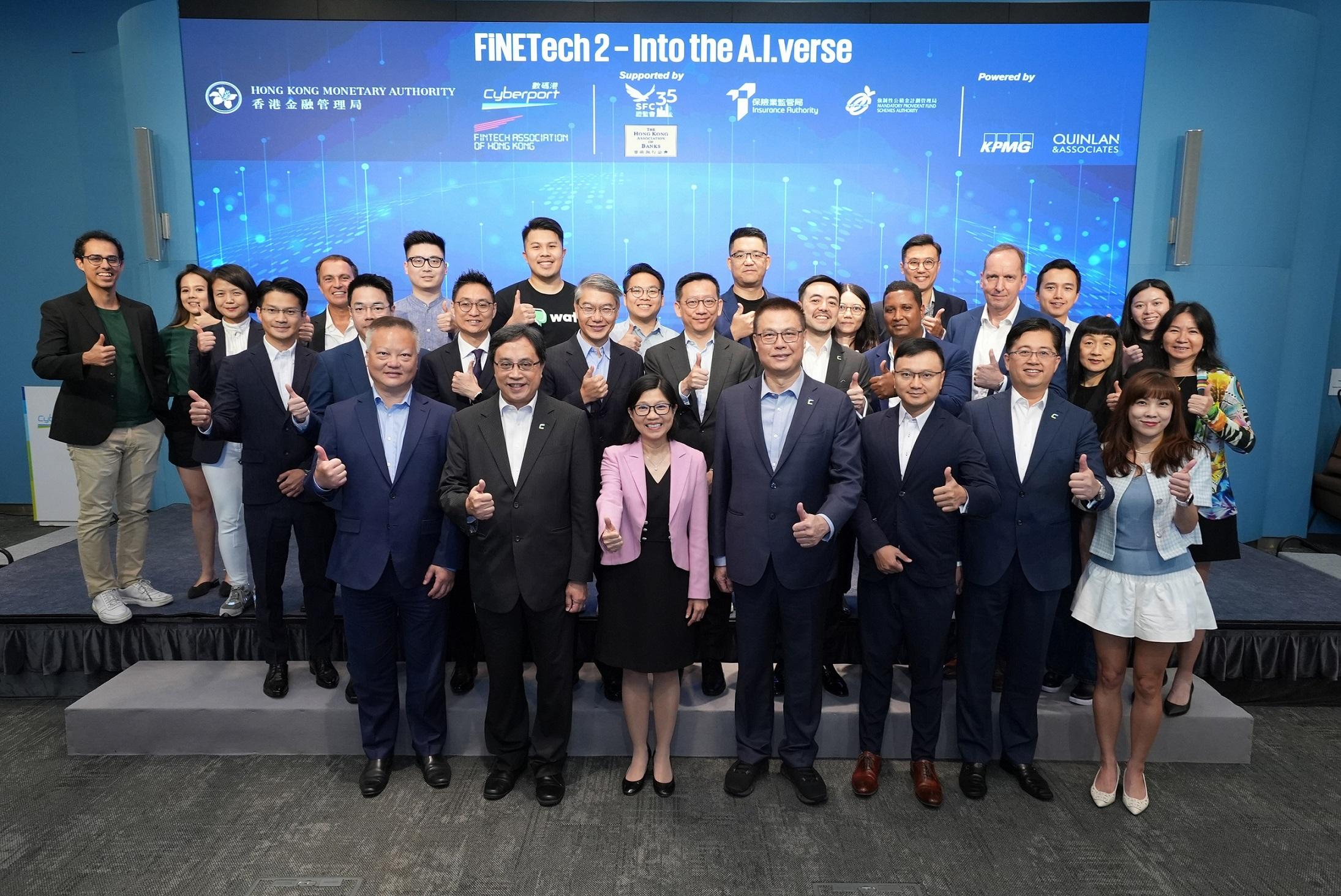 The Executive Director (Banking Supervision) of the Hong Kong Monetary Authority, Ms Carmen Chu (front row, third left); the Chairman of the Hong Kong Cyberport Management Company Limited, Mr Simon Chan (front row, second left); and representatives from financial regulators, banks as well as other financial institutions, industry associations and Fintech solutions providers take part in FiNETech2 today (August 13).