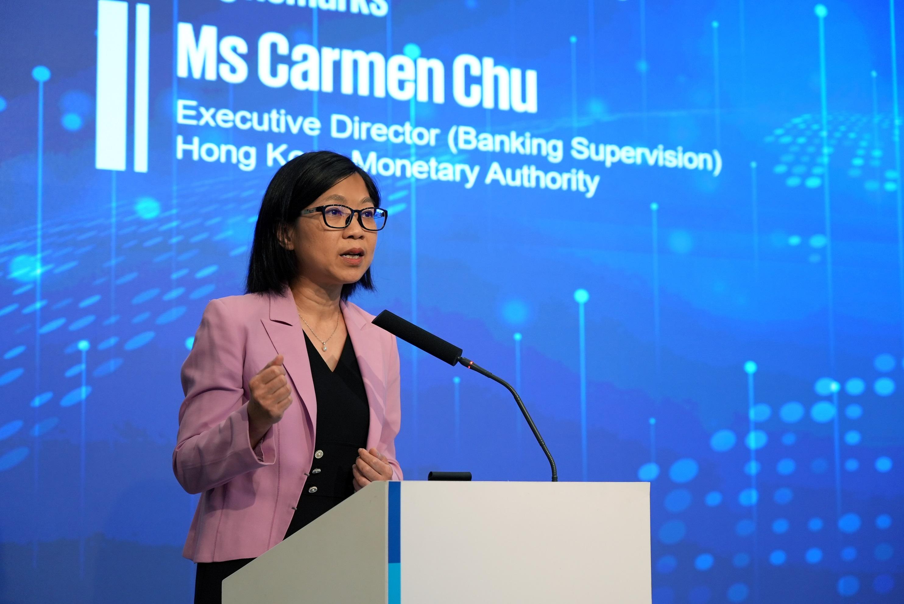 The Executive Director (Banking Supervision) of the Hong Kong Monetary Authority, Ms Carmen Chu, delivers opening remarks today (August 13) at FiNETech2.