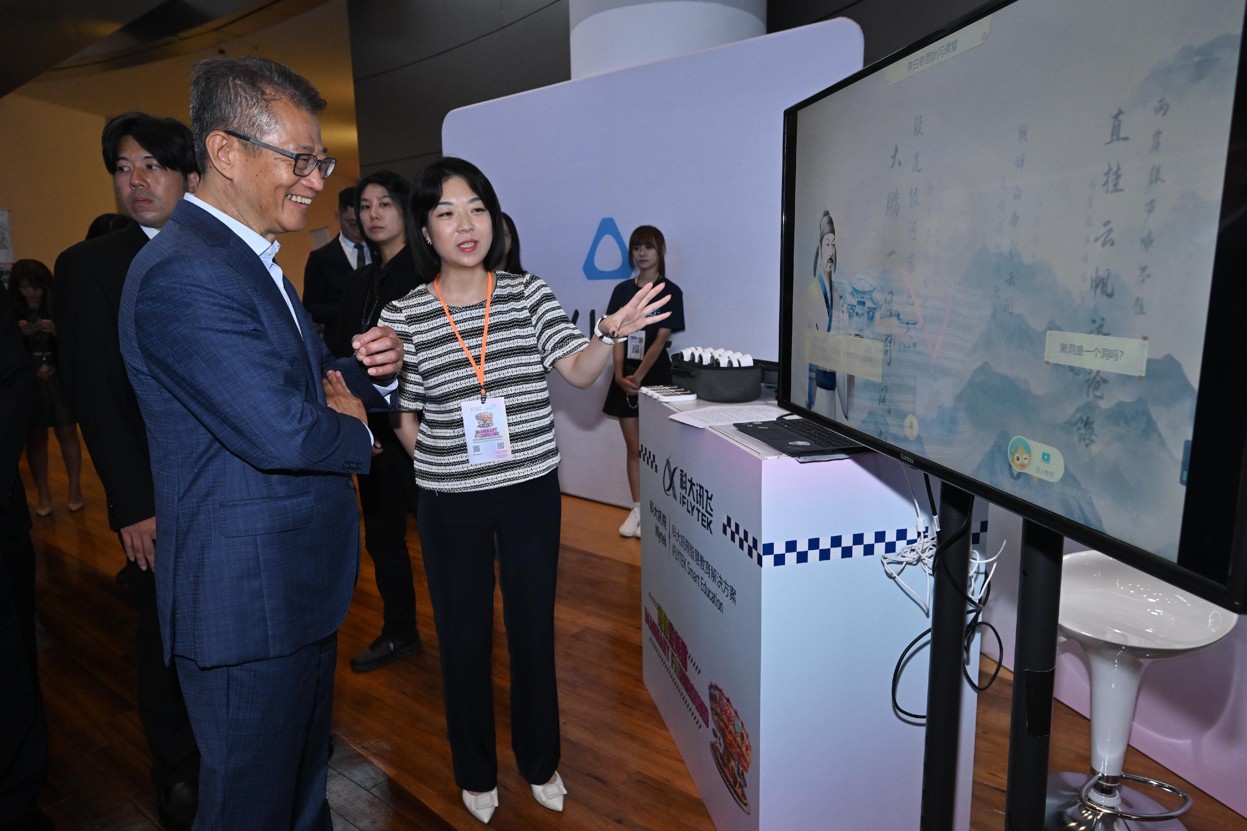 The Financial Secretary, Mr Paul Chan, attended the Digital Entertainment Leadership Forum 2024 today (August 16). Photo shows Mr Chan (first left) touring the experience zones.