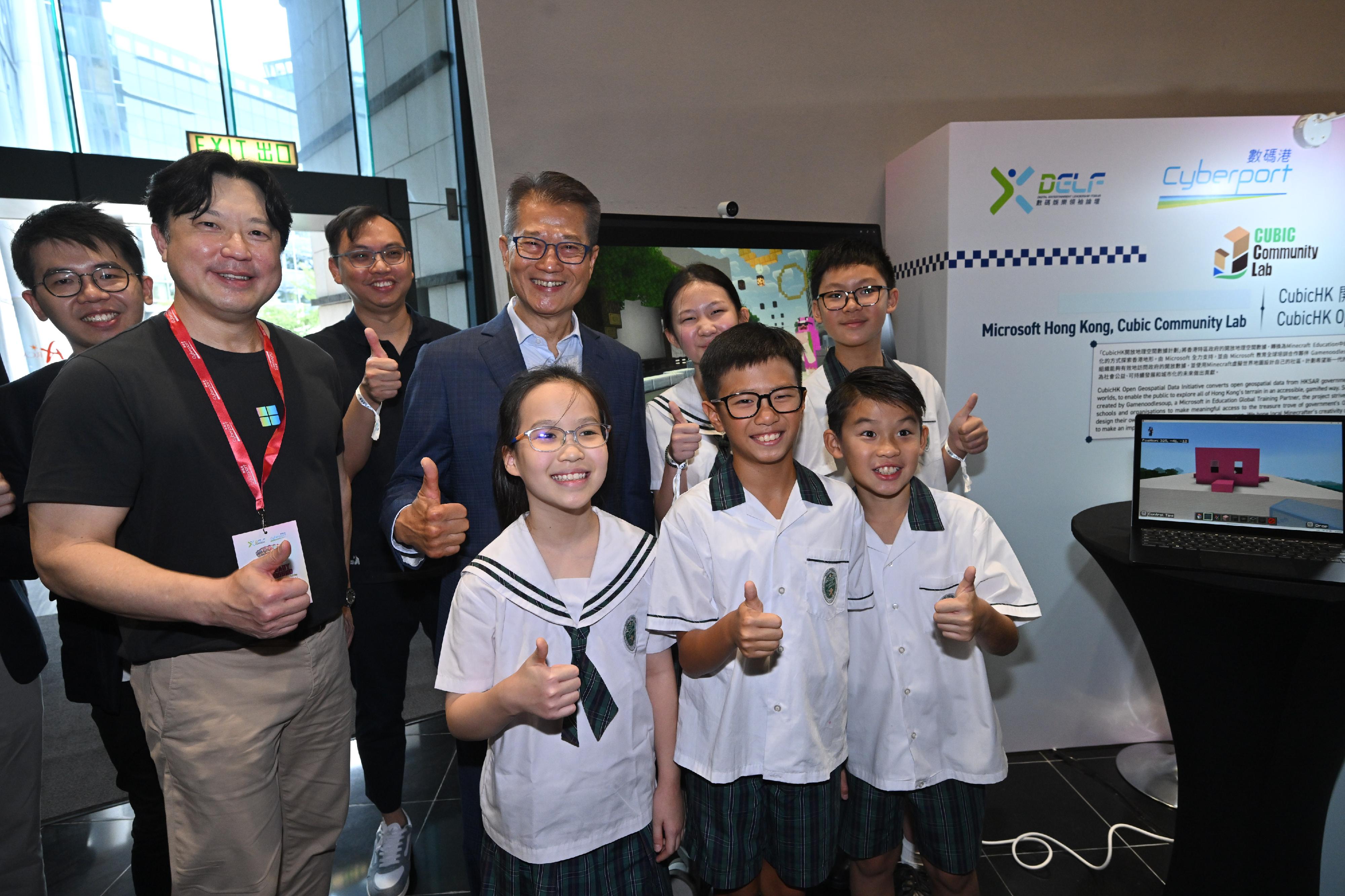 The Financial Secretary, Mr Paul Chan, attended the Digital Entertainment Leadership Forum 2024 today (August 16). Photo shows Mr Chan (back row, third right) touring the experience zones.