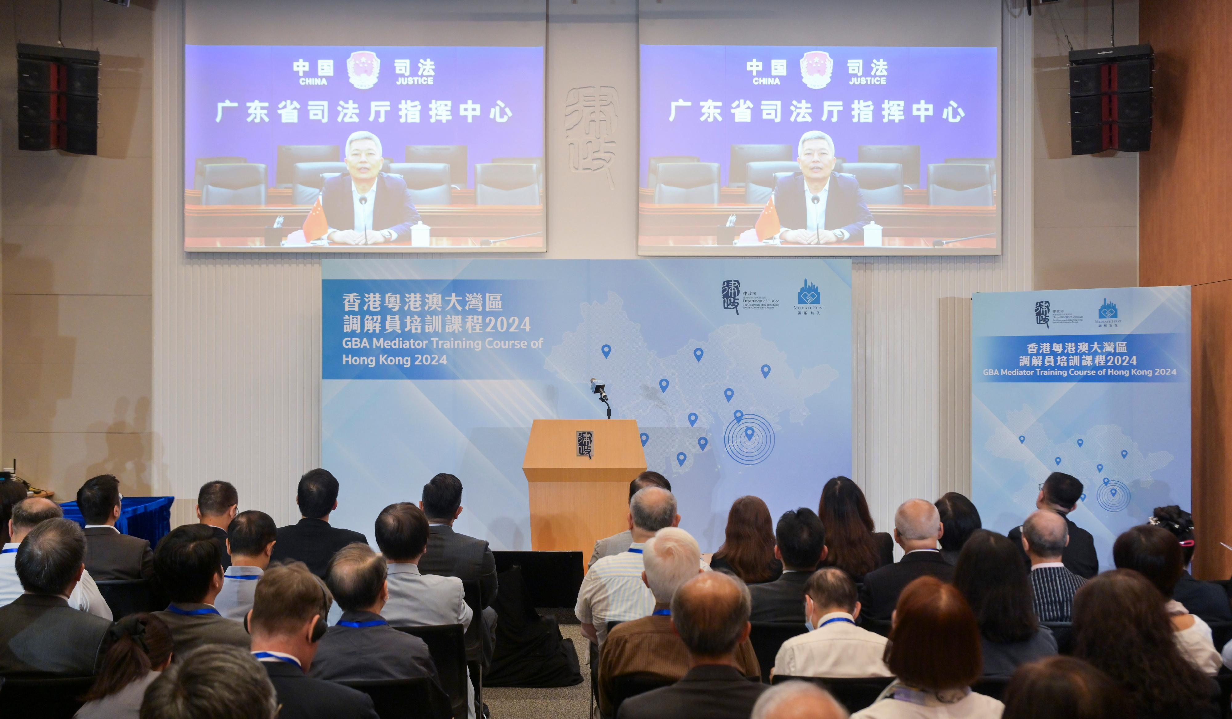 To promote the interface of the non-litigation dispute resolution services in the Guangdong-Hong Kong-Macao Greater Bay Area (GBA), the Department of Justice held the first GBA Mediator Training Course of Hong Kong today (August 16). Photo shows Deputy Director-General of the Department of Justice of Guangdong Province Mr Lin Chuming delivering his opening remarks online for the training course.
