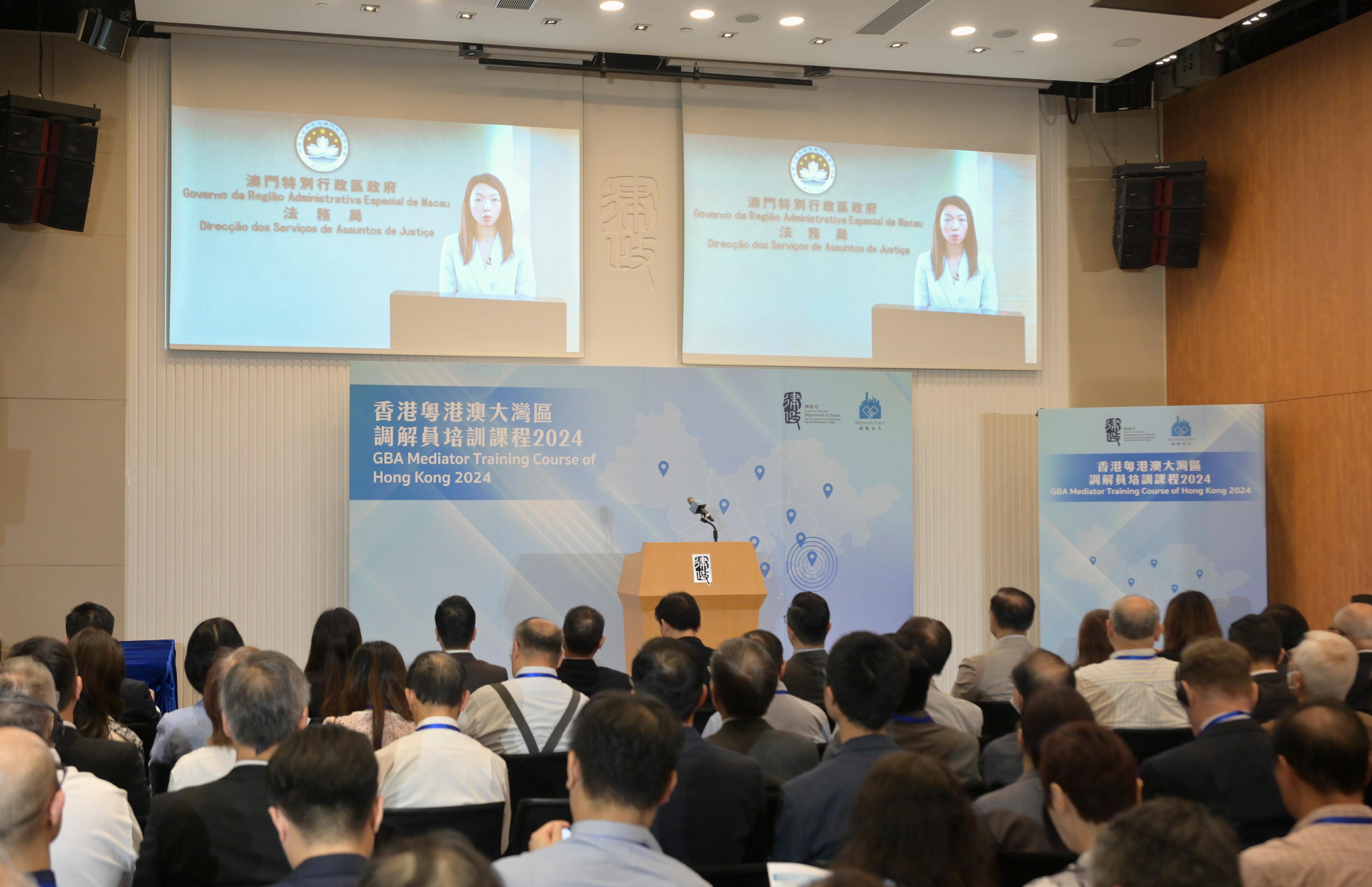 To promote the interface of the non-litigation dispute resolution services in the Guangdong-Hong Kong-Macao Greater Bay Area (GBA), the Department of Justice held the first GBA Mediator Training Course of Hong Kong today (August 16). Photo shows the Director of the Legal Affairs Bureau of the Macao Special Administrative Region Government, Ms Leong Weng-in, delivering her opening remarks online for the training course.
