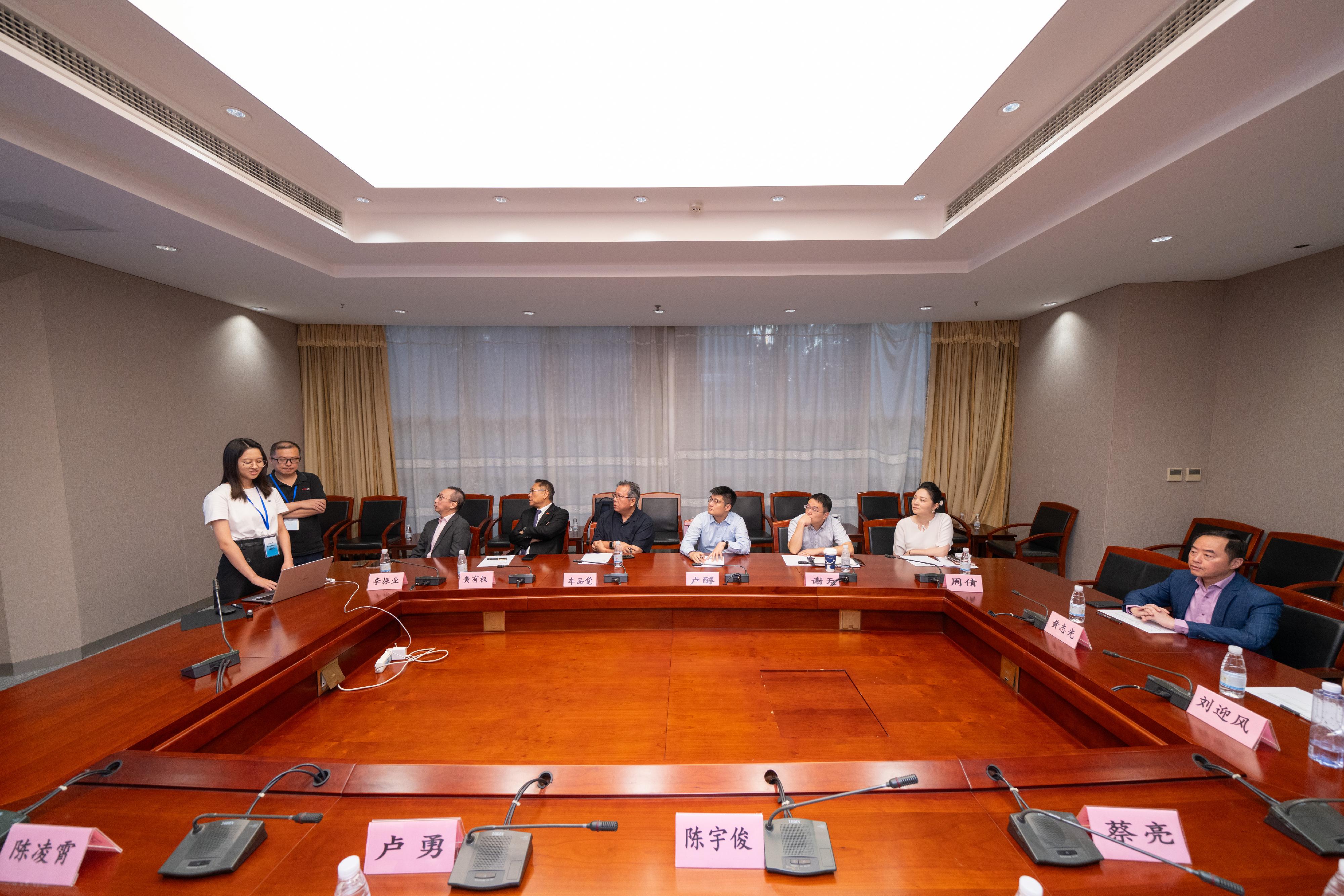 The Commissioner for Digital Policy, Mr Tony Wong (first right), attends the Grand Award judging of the Hong Kong/Shanghai Co-operation Open Data Challenge 2024 in Shanghai yesterday (August 15).