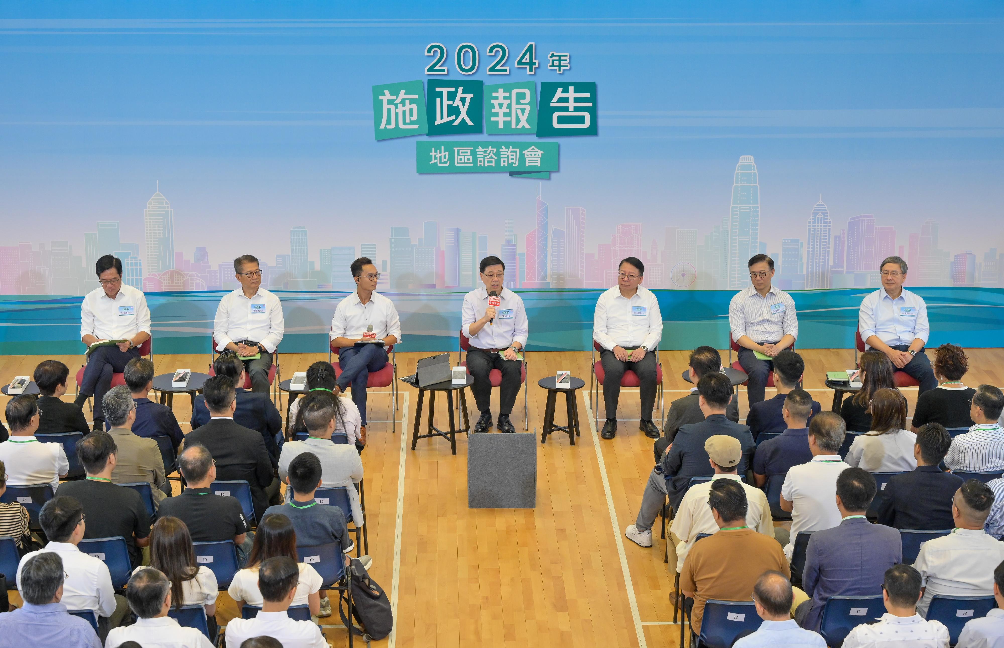 The Chief Executive, Mr John Lee, attended the 2024 Policy Address District Forum with some Principal Officials this morning (August 18) to listen to views and suggestions of local community members on the upcoming Policy Address. Photo shows Mr Lee (centre); the Chief Secretary for Administration, Mr Chan Kwok-ki (third right); the Financial Secretary, Mr Paul Chan (second left); the Acting Secretary for Justice, Mr Cheung Kwok-kwan (second right); the Deputy Chief Secretary for Administration, Mr Cheuk Wing-hing (first right); and the Deputy Financial Secretary, Mr Michael Wong (first left), listening to views of the public at the consultation session.