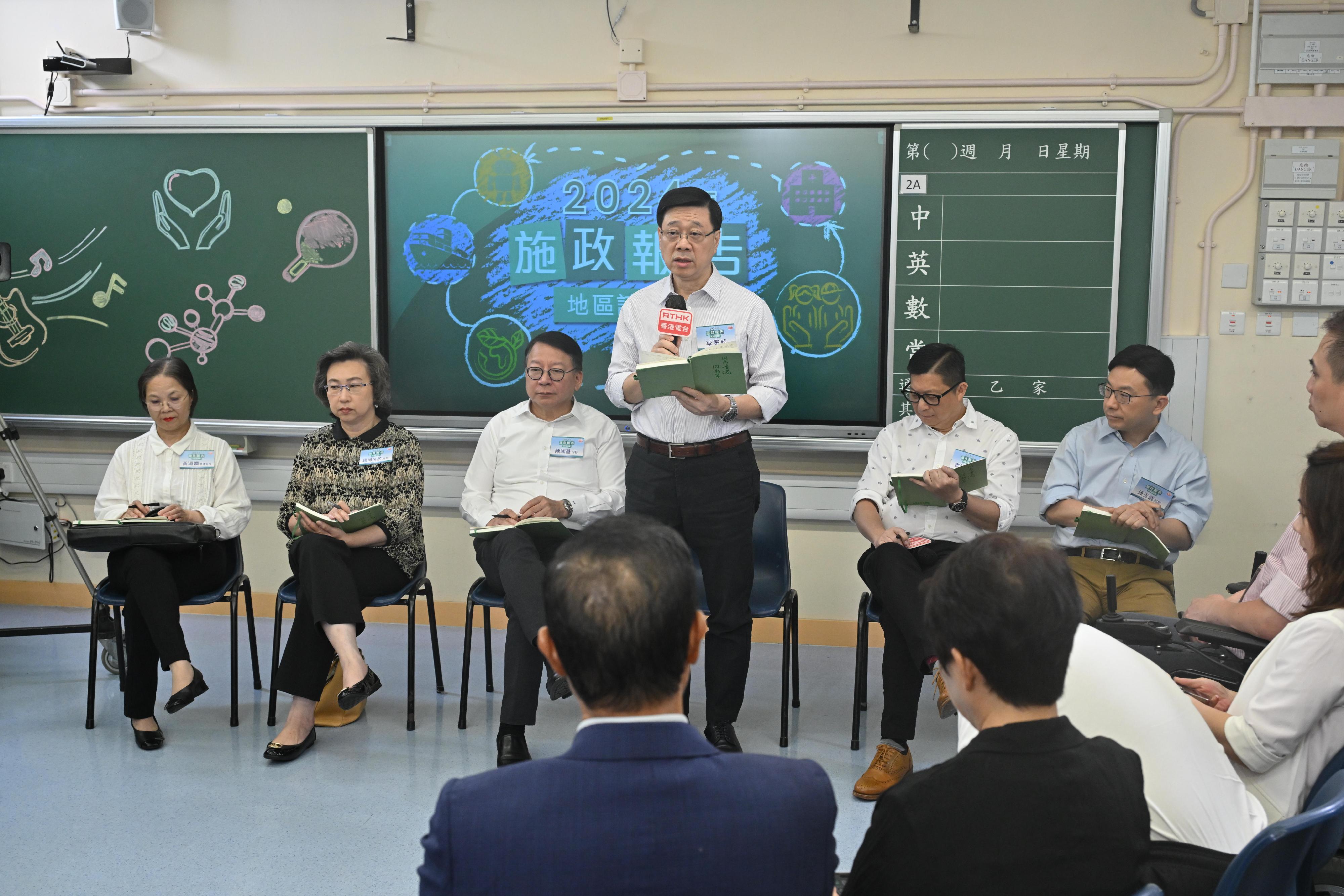 The Chief Executive, Mr John Lee, attended the 2024 Policy Address District Forum with some Principal Officials this morning (August 18) to listen to views and suggestions of local community members on the upcoming Policy Address. Photo shows (from left) the Acting Secretary for Environment and Ecology, Miss Diane Wong; the Secretary for the Civil Service, Mrs Ingrid Yeung; the Chief Secretary for Administration, Mr Chan Kwok-ki; Mr Lee; the Secretary for Security, Mr Tang Ping-keung; and the Secretary for Labour and Welfare, Mr Chris Sun, listening to views of the public at the consultation session.