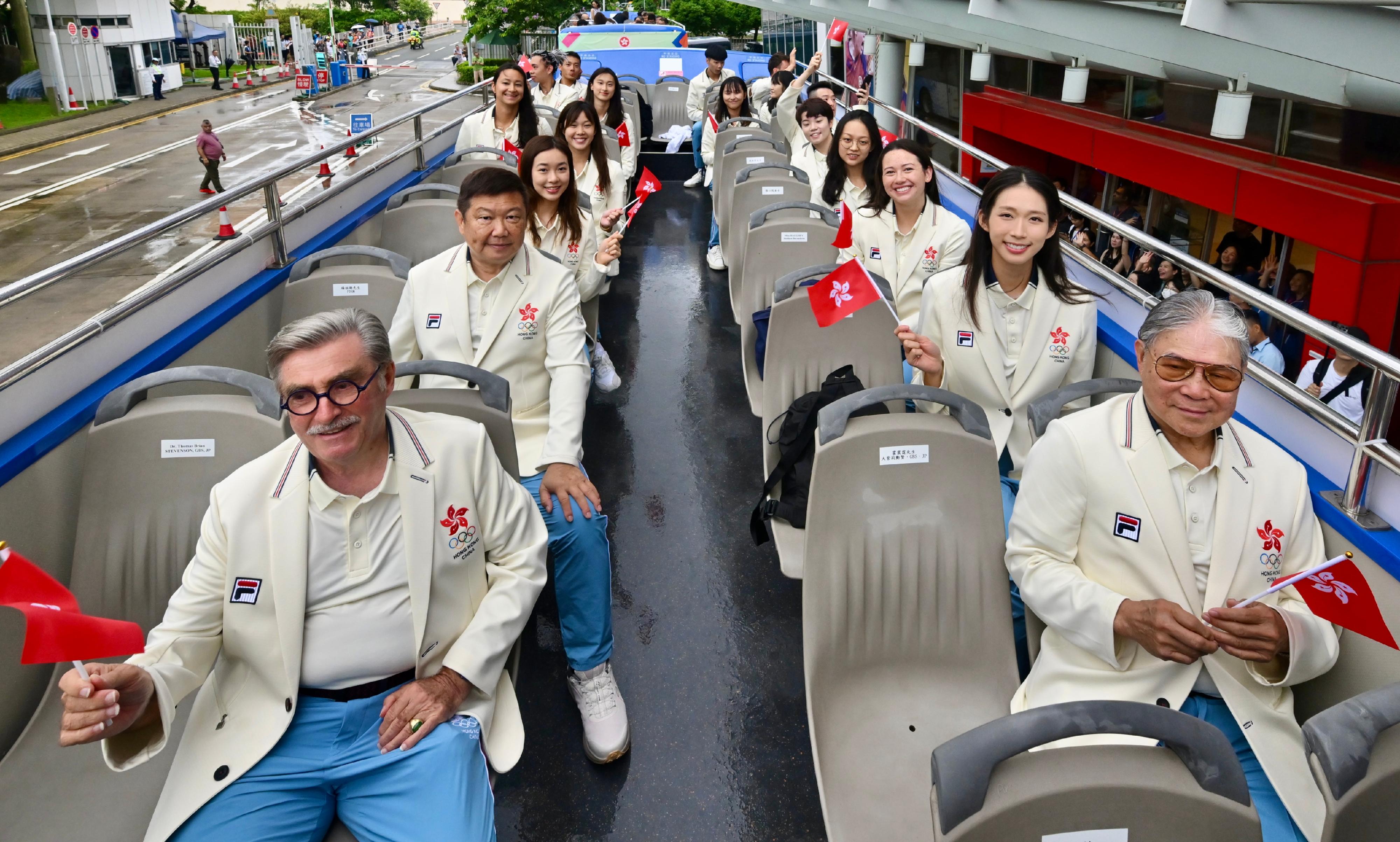 The Hong Kong Special Administrative Region Government and the Sports Federation & Olympic Committee of Hong Kong, China arranged a bus parade and Welcome Home Reception today (August 21) for the Hong Kong, China Delegation to the 2024 Paris Olympic Games. Photo shows athletes and other Delegation members in the bus parade.
