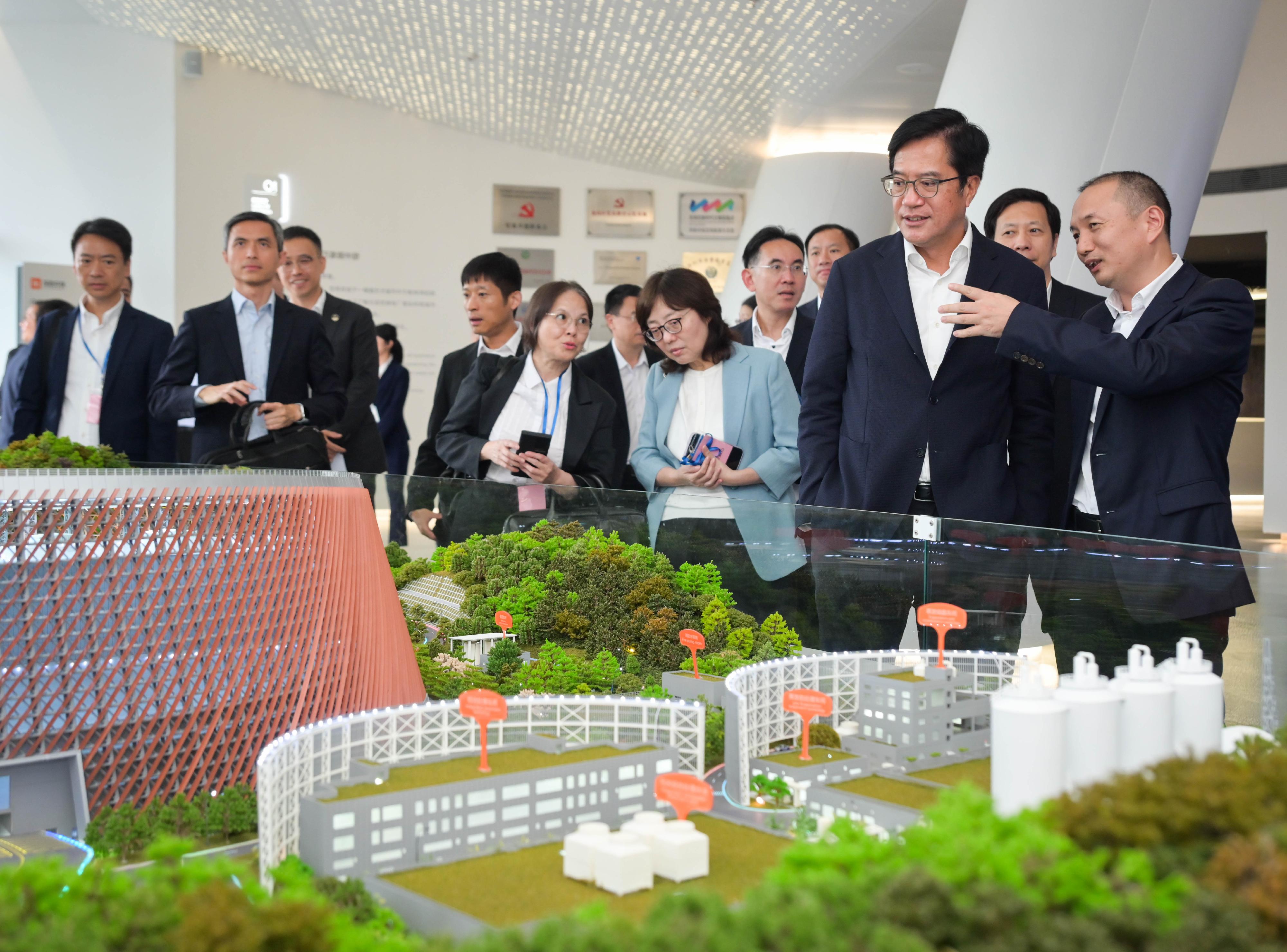 The Deputy Financial Secretary, Mr Michael Wong, and Vice Mayor of the Shenzhen Municipal People's Government Mr Tao Yongxin, leading delegations of the governments of the Hong Kong Special Administrative Region (HKSAR) and Shenzhen respectively, held a meeting of the Task Force for Collaboration on the Northern Metropolis Development Strategy in Shenzhen today (August 21). Photo shows Mr Wong (second right) and the HKSAR delegation visiting Longgang Energy Ecological Park after the meeting to learn more about its operation.
