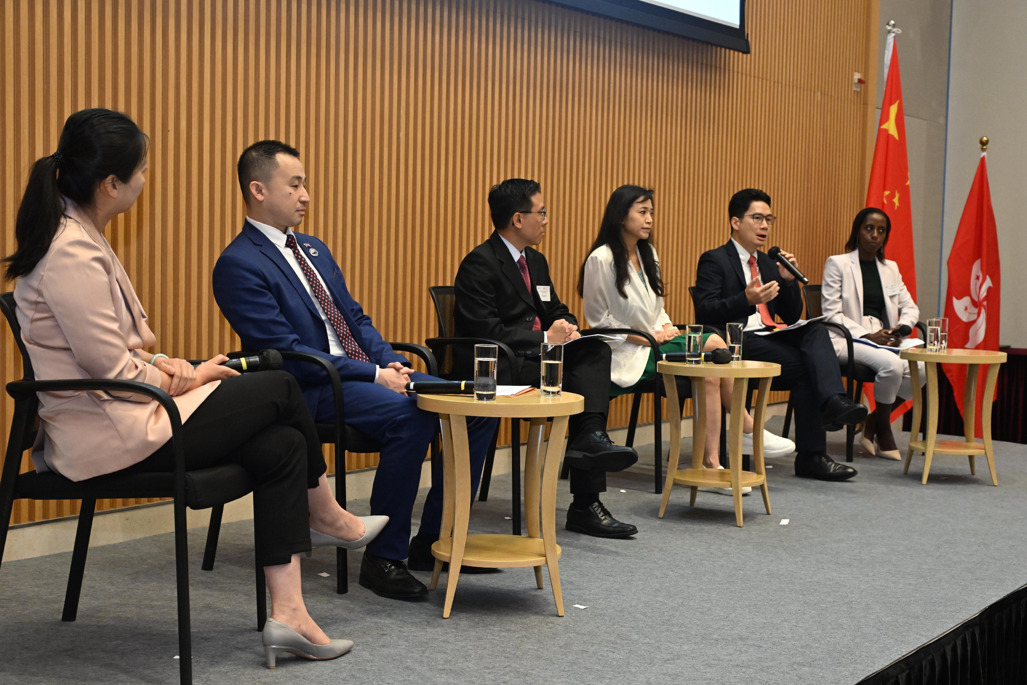 Cohosted by the Financial Services and the Treasury Bureau and the United Nations (UN) in China, the United Nations Pre-Summit of the Future Dialogue and Hong Kong Financial Services Sector Celebrating the 75th Anniversary of the Founding of the People's Republic of China Lunch Reception was held today (August 22). Photo shows (from left) the Head of China Office of the United Nations Global Compact, Ms Liu Meng; Vice Minister of the Ministry of Commerce, Royal Government of Cambodia, Mr Lim Lork Piseth; Dean of College of Liberal Arts and Social Sciences, City University of Hong Kong, Professor Alfred Ho; the Vice Chairman of Regal Hotels Group and Founder of the Institute of Sustainability and Technology,  Professor Poman Lo; the Under Secretary for Financial Services and the Treasury, Mr Joseph Chan; and the Head of Sub-Office for the International Organization for Migration, the Hong Kong Special Administrative Region, Ms Myriam Abiyera Mwizerwa, at the panel Leaders' Dialogue on the Interrelationship between Climate Change, Public Health and Artificial Intelligence of the Pre-Summit.
