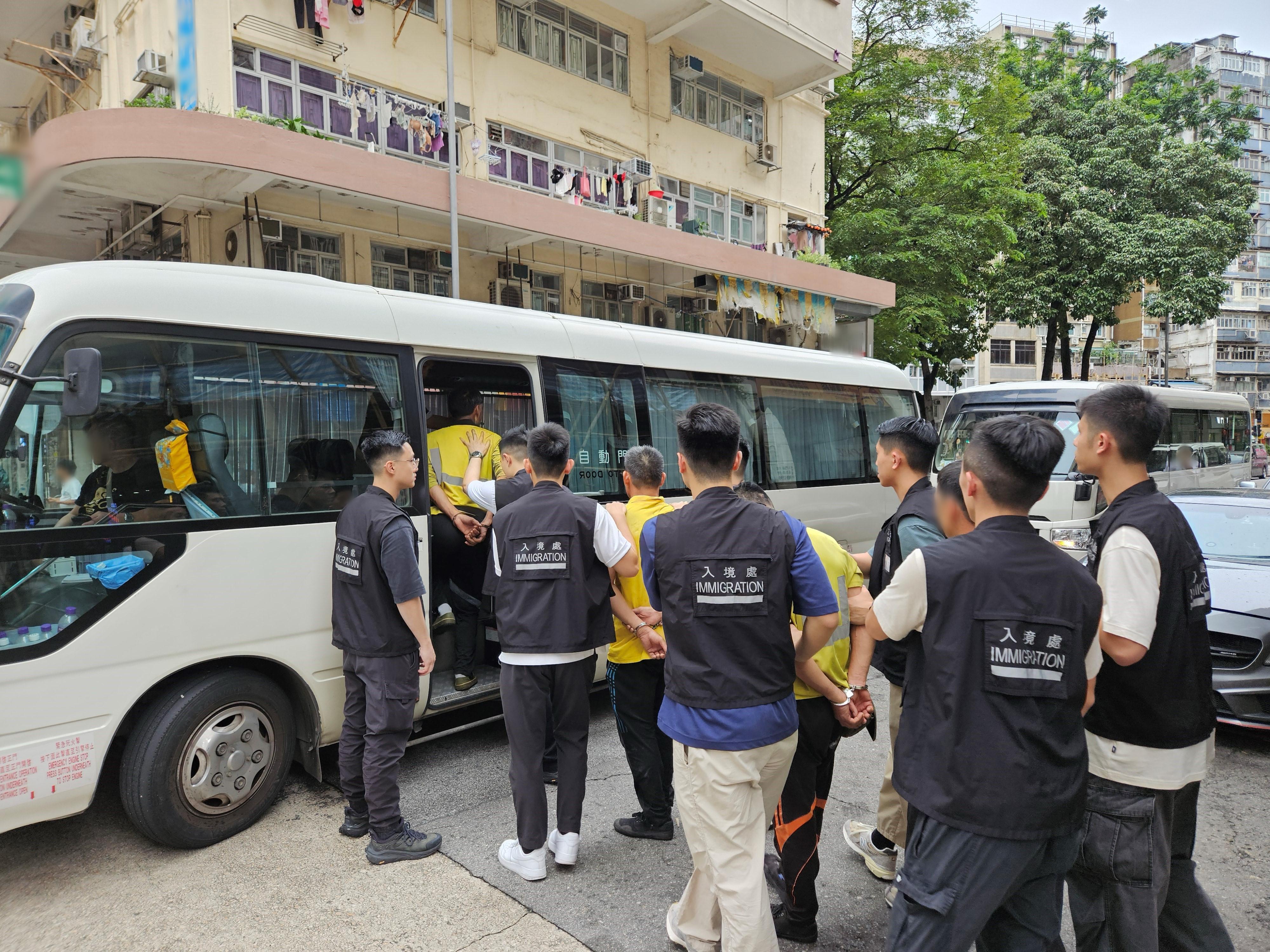 The Immigration Department mounted a series of territory-wide anti-illegal worker operations codenamed "Lightshadow" and "Twilight", and joint operations with the Hong Kong Police Force codenamed "Champion" and "Windsand", for four consecutive days from August 19 to yesterday (August 22). Photo shows suspected illegal workers arrested during an operation.