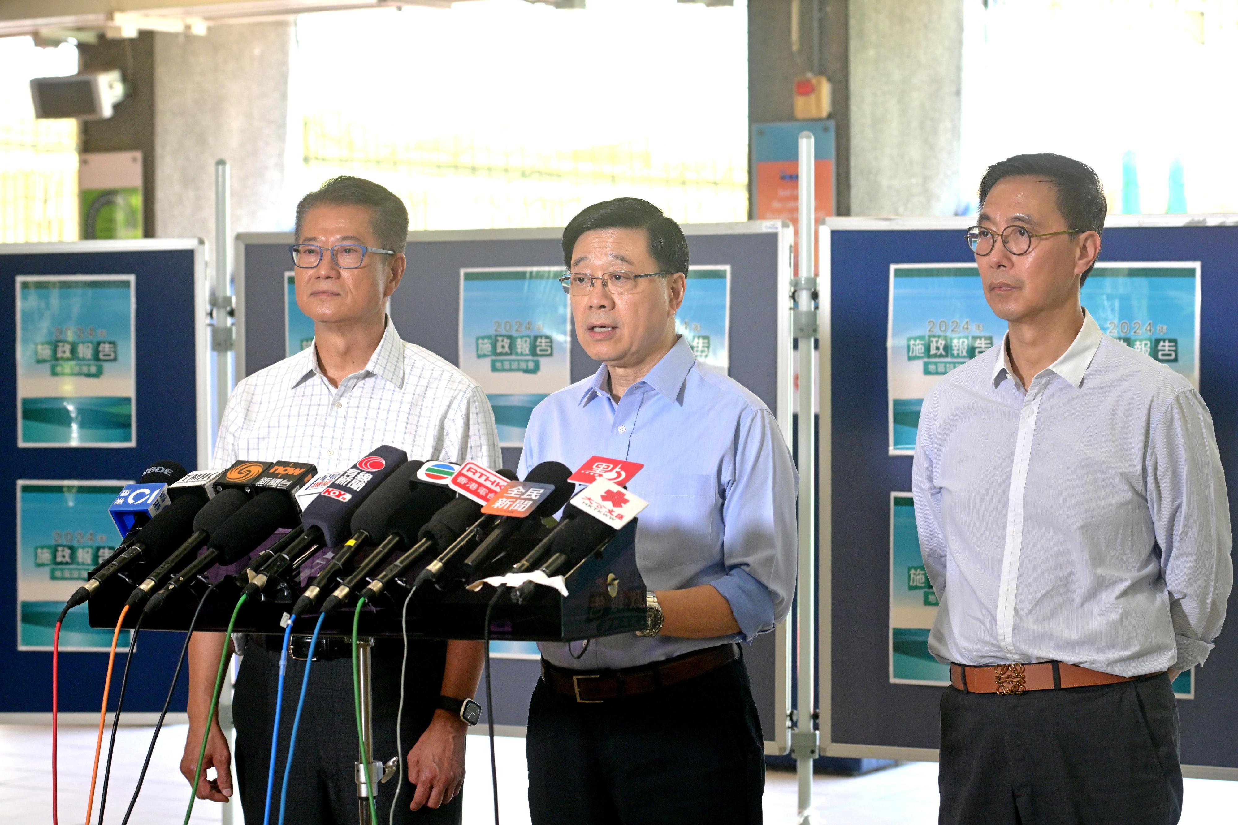 The Chief Executive, Mr John Lee, attended the second 2024 Policy Address District Forum with some Principal Officials this morning (August 25) to listen to views and suggestions of local community members on the upcoming Policy Address. Photo shows Mr Lee (centre); the Financial Secretary, Mr Paul Chan (left); and the Secretary for Culture, Sports and Tourism, Mr Kevin Yeung (right), meeting the media after the District Forum.