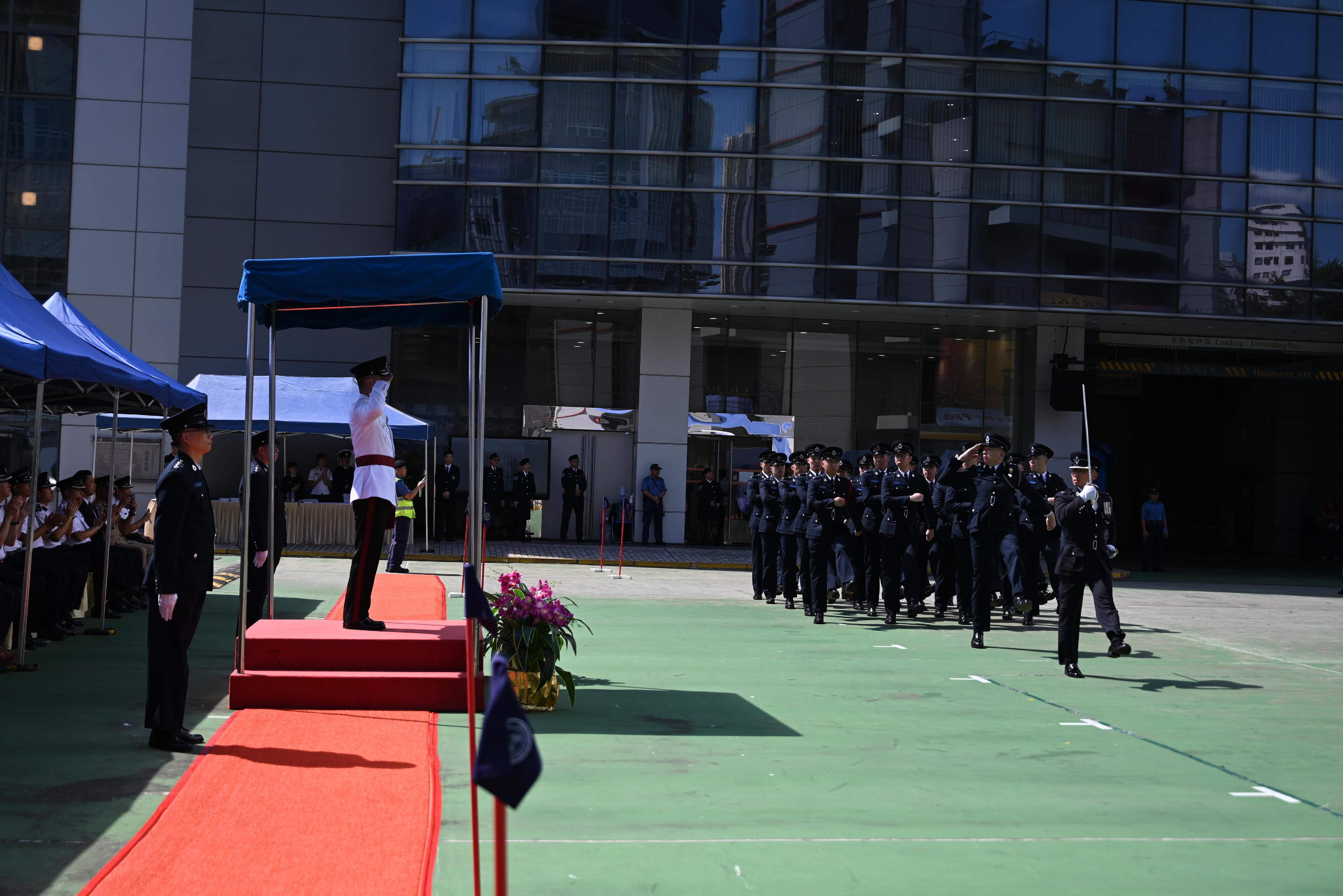 The Civil Aid Service held the 88th Recruits Passing-out Parade at its headquarters today (August 25). Photo shows the parade marching past the review stand.